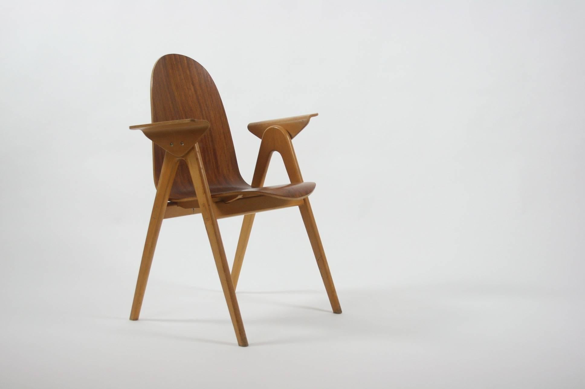 Teak plywood and beech molded chair.