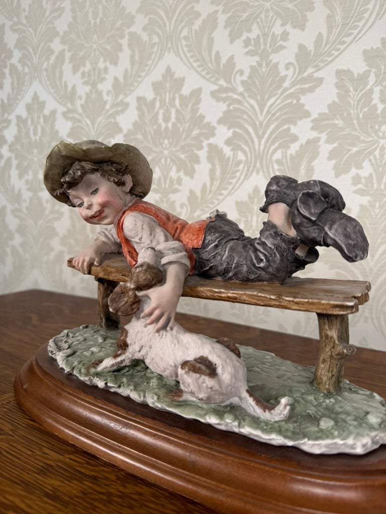 Italian Capodimonte Style Figure Boy with Dog on Bench, Giuseppe