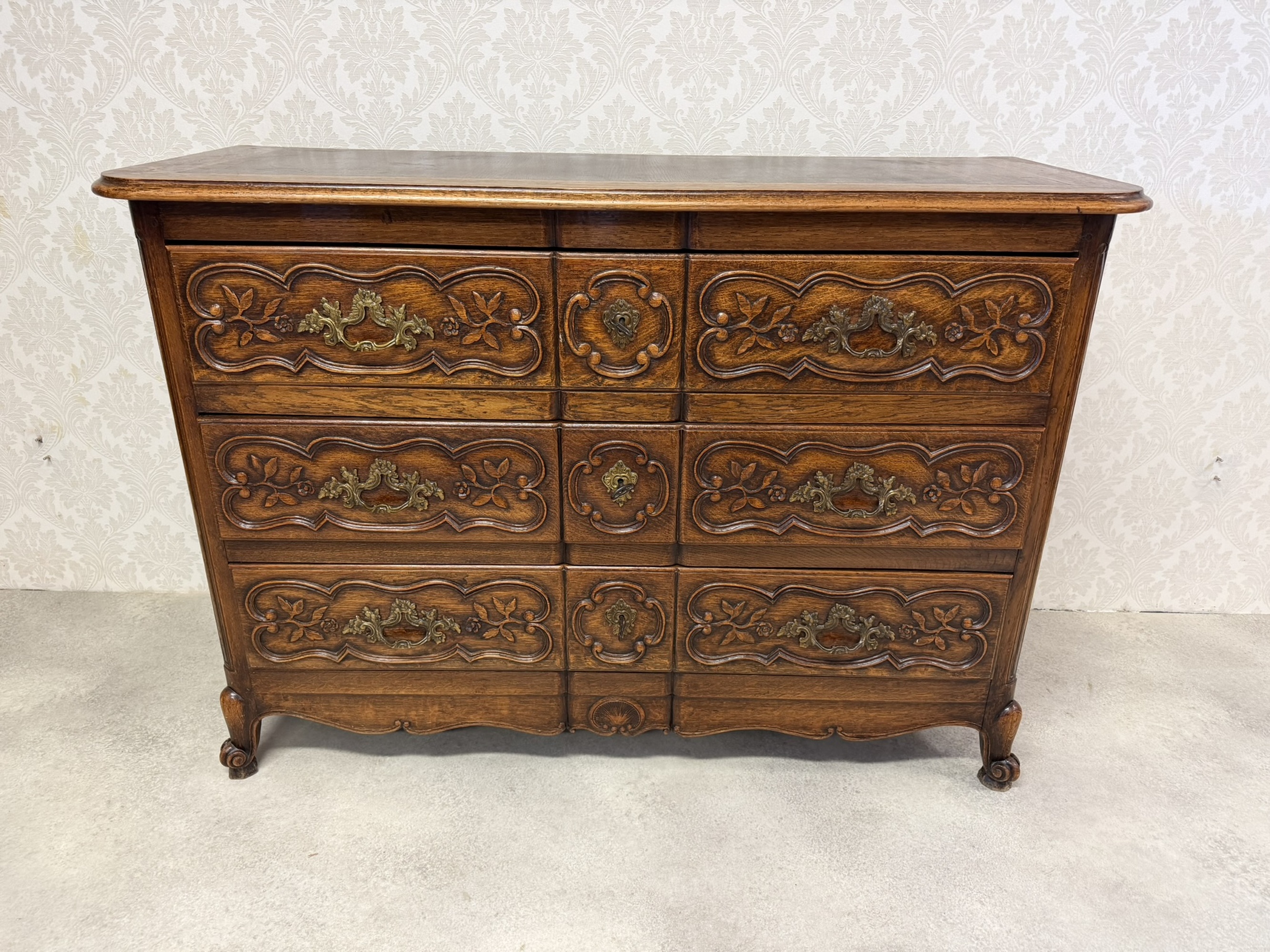 Antique French Louis XV Carved Oak Commode with Brass Hardware