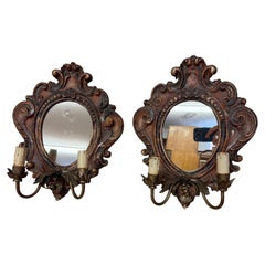 Coppia di applique da parete antiche in legno intagliato in stile neobarocco