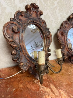 Coppia di applique da parete antiche in legno intagliato in stile neobarocco