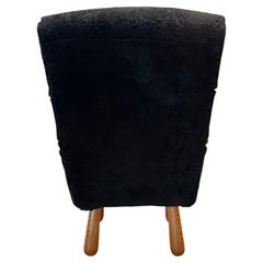 Scandinavian Arm Chair Reupholstered in Black Sheep's Skin (2)