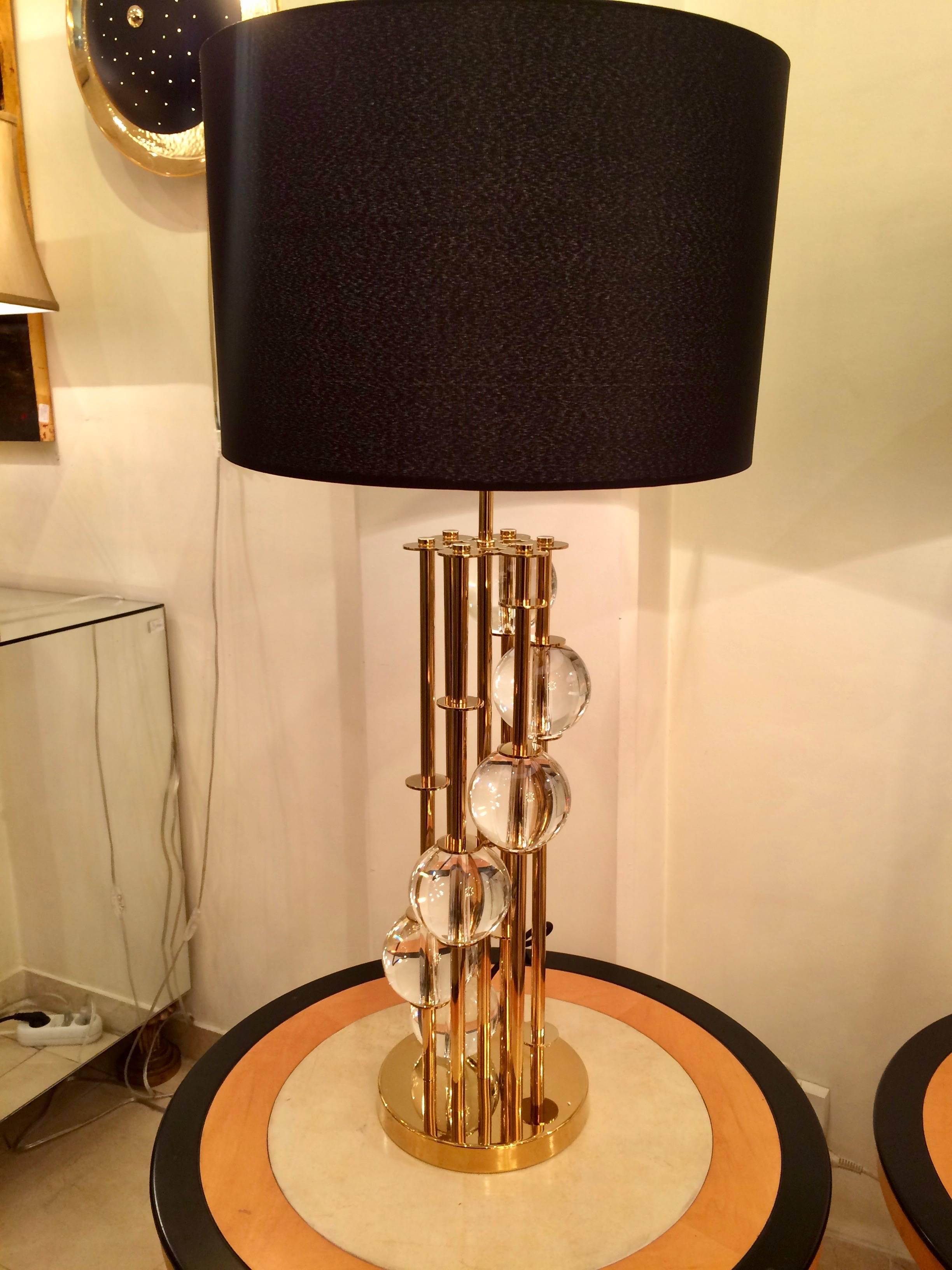 Very nice pair of big lamps in brass.
Decoration made with big crystal bowls
black round shades.
This item can be ordered in silver color.