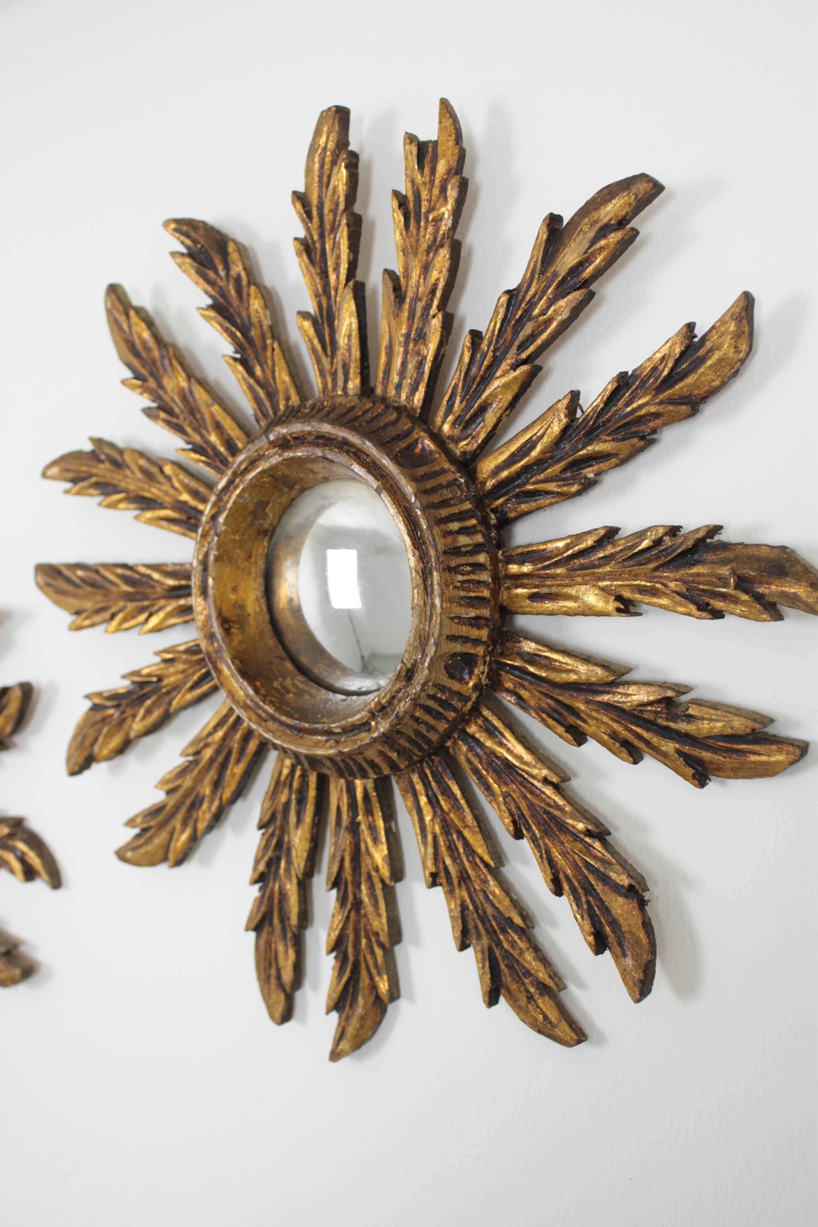 Gold Leaf Pair of Early 20th Century Giltwood Convex Mini Sunburst Mirrors