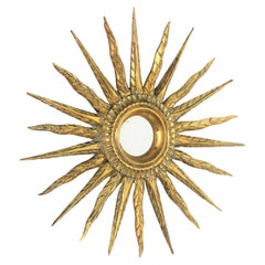 Miroir espagnol sculpté en bois doré étoilé Sunburst