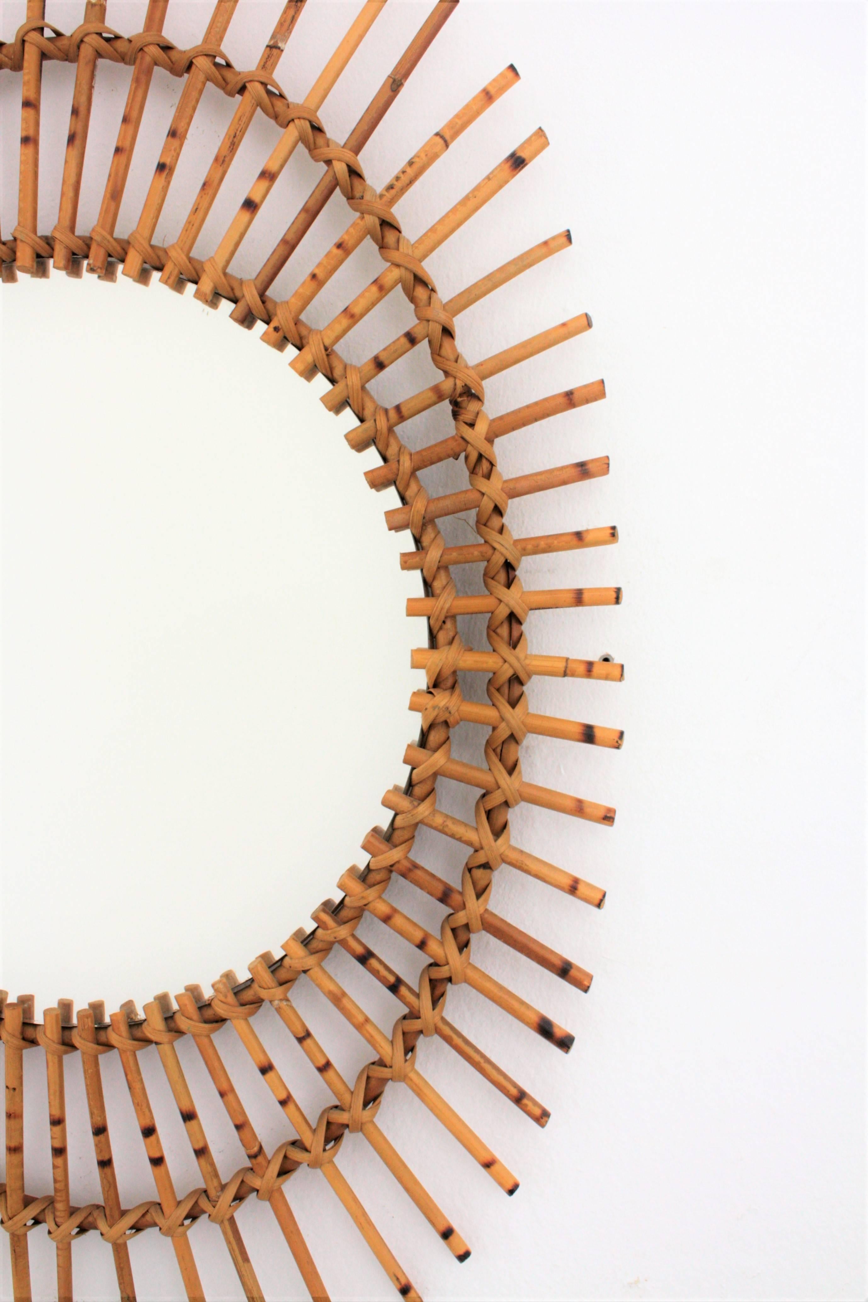 Mid-20th Century Mid-Century Modern French Riviera Rattan Asymmetric Oval Sunburst Mirror