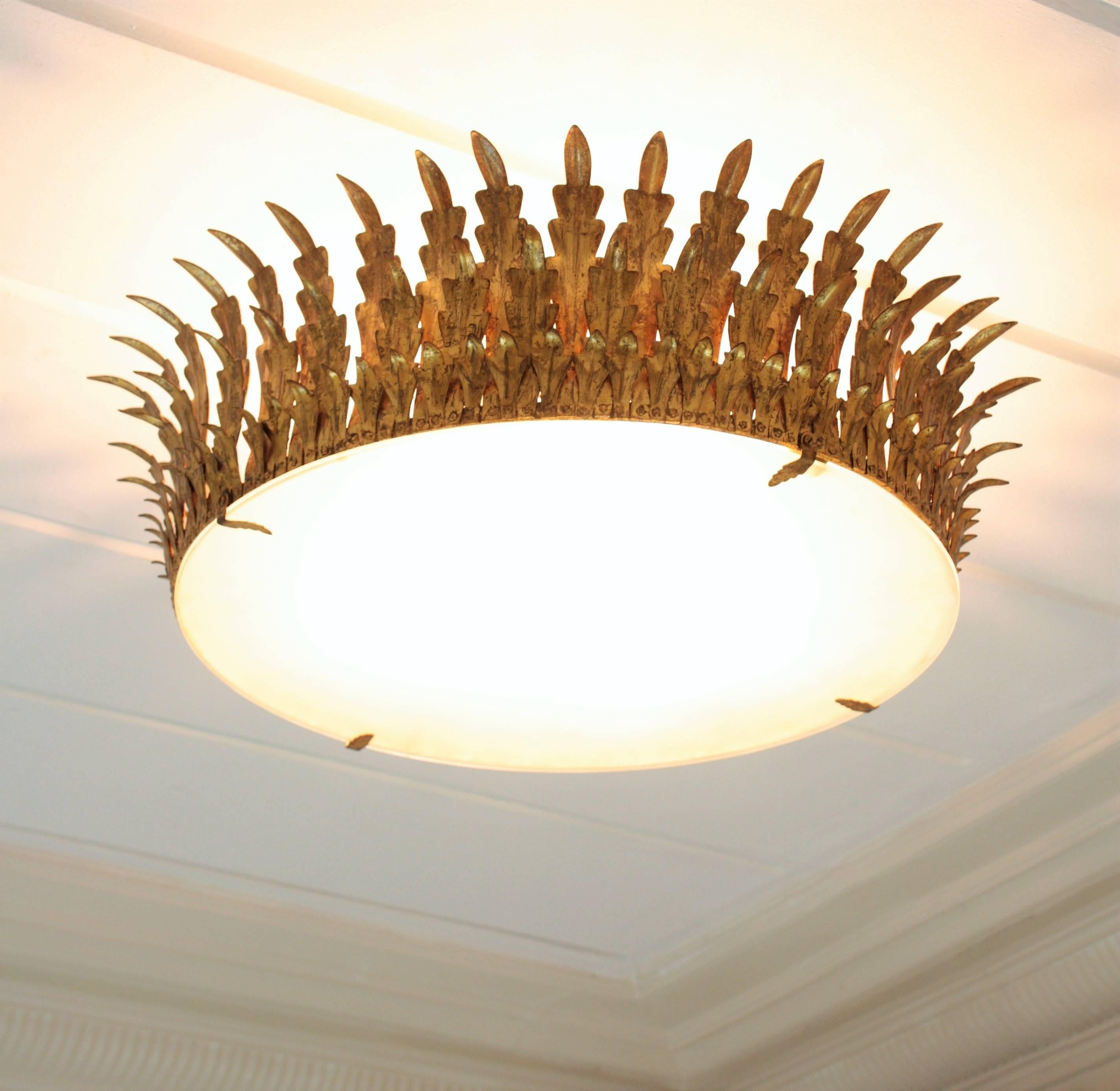 Frosted Two Extra Large Neoclassical Gilt Iron Sunburst Crown Ceiling Light Fixtures