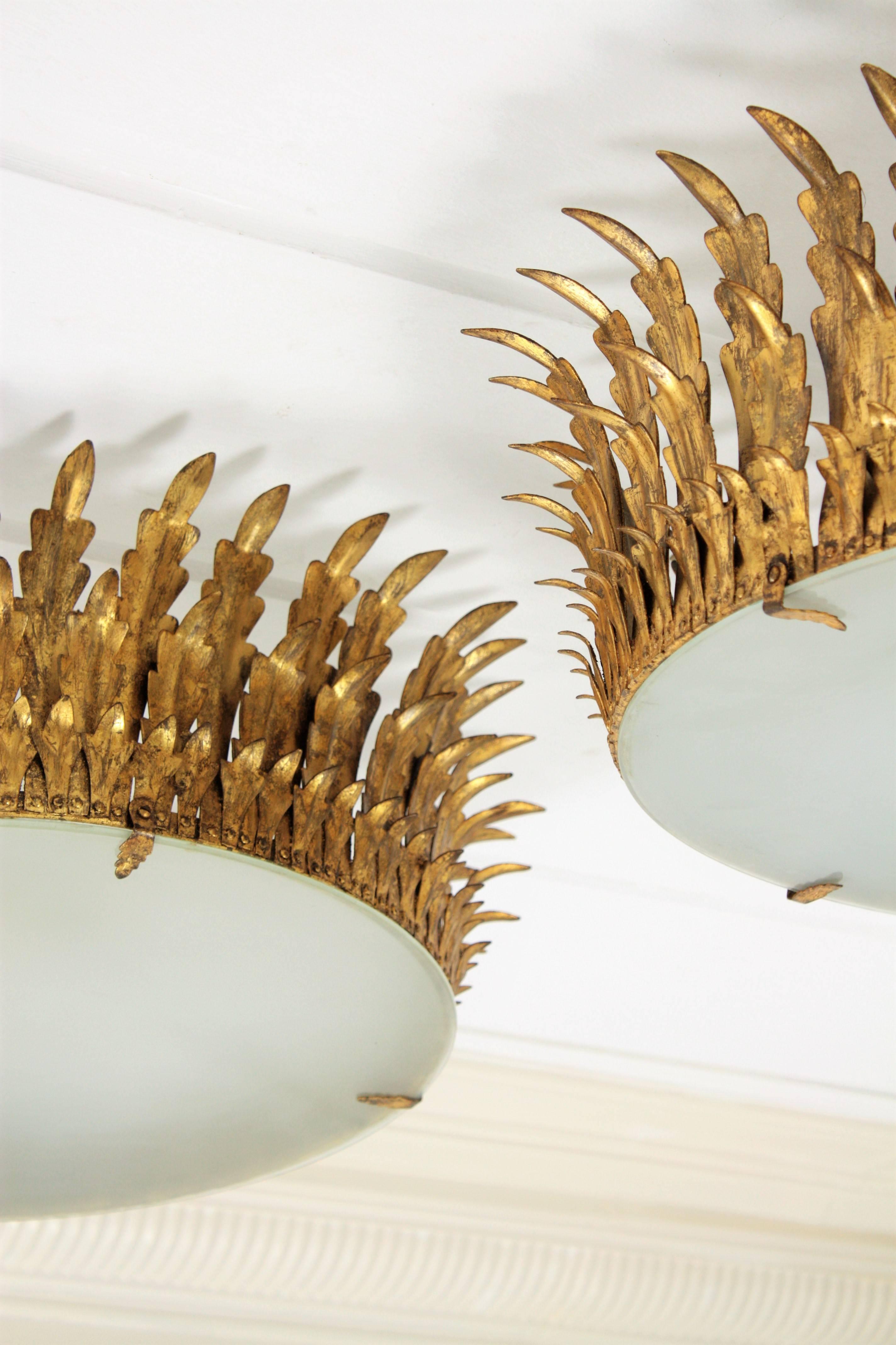 Gold Leaf Two Extra Large Neoclassical Gilt Iron Sunburst Crown Ceiling Light Fixtures