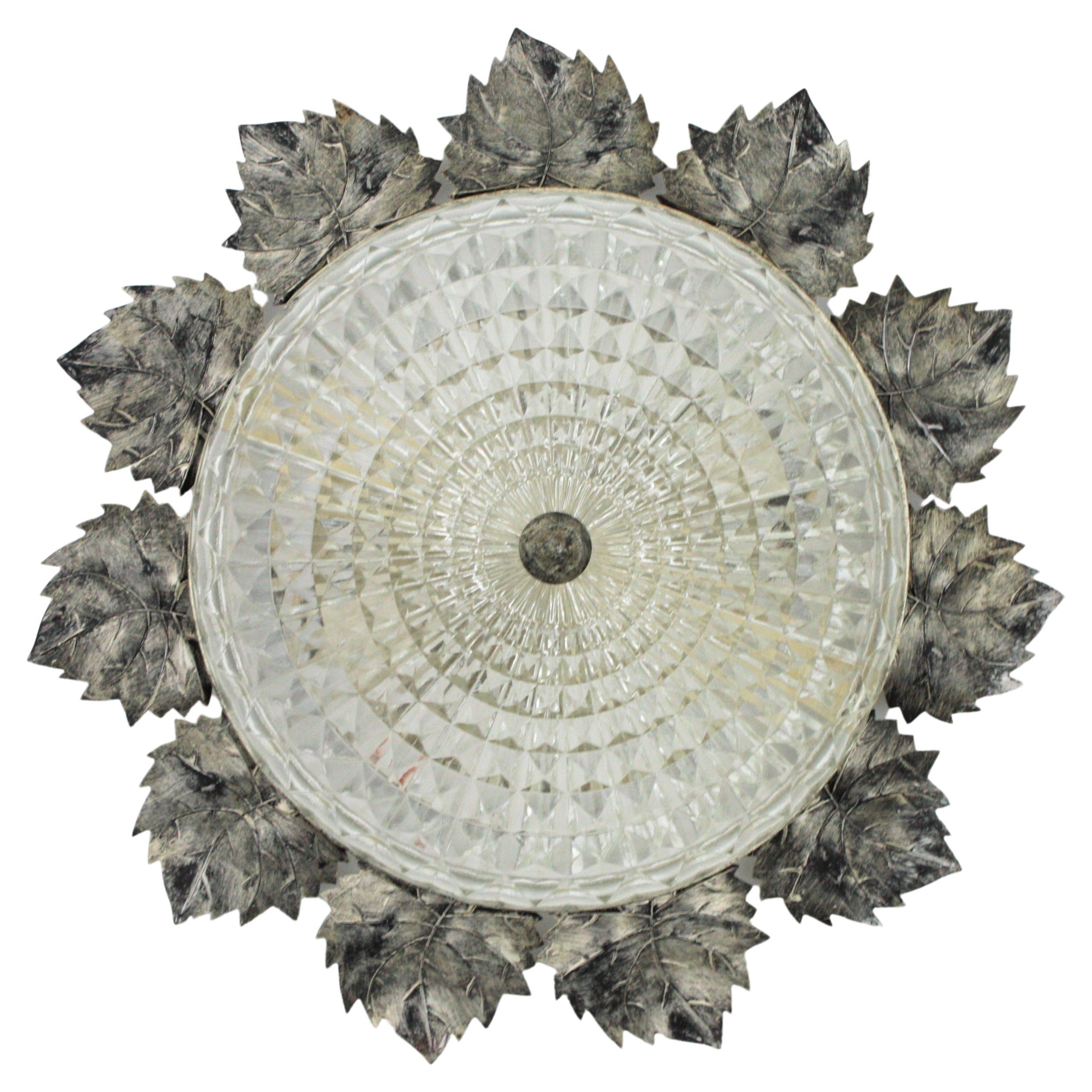Sunburst Silver Patinated Iron and Glass Flush Mount Light, Leaves Design For Sale
