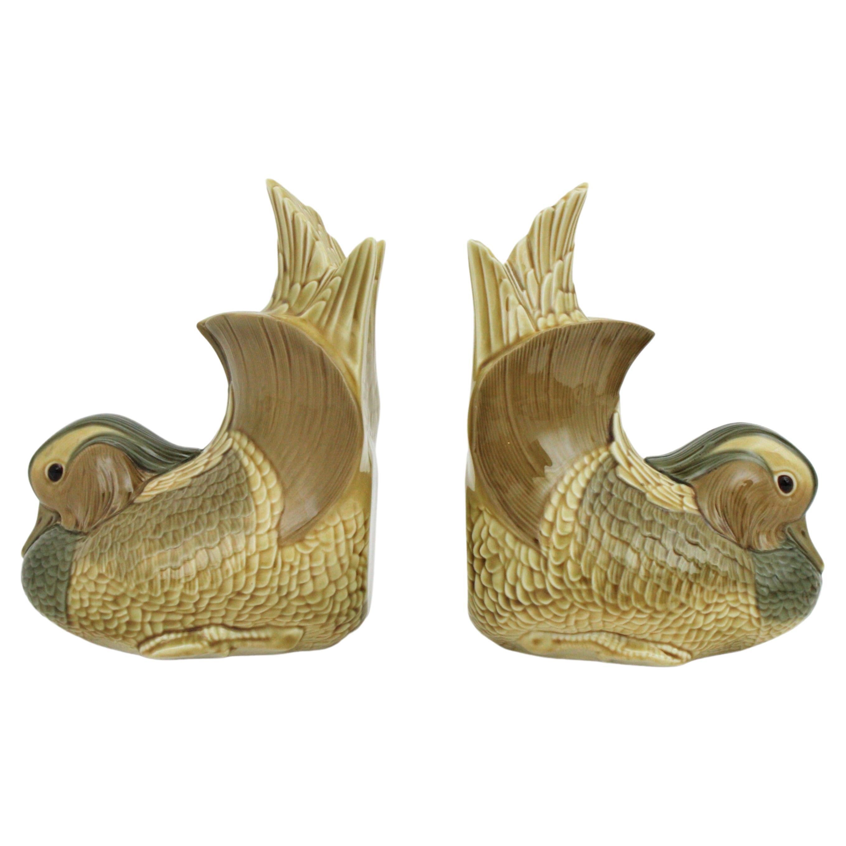 Eye-catching pair of Mandarin Duck porcelain bookends / book holders. Designed by Vicente Martinez and manufactured by Lladro, Spain, 1970s.
As all the Lladro pieces this pair of sculptural book ends show an elegant design with softs colors that