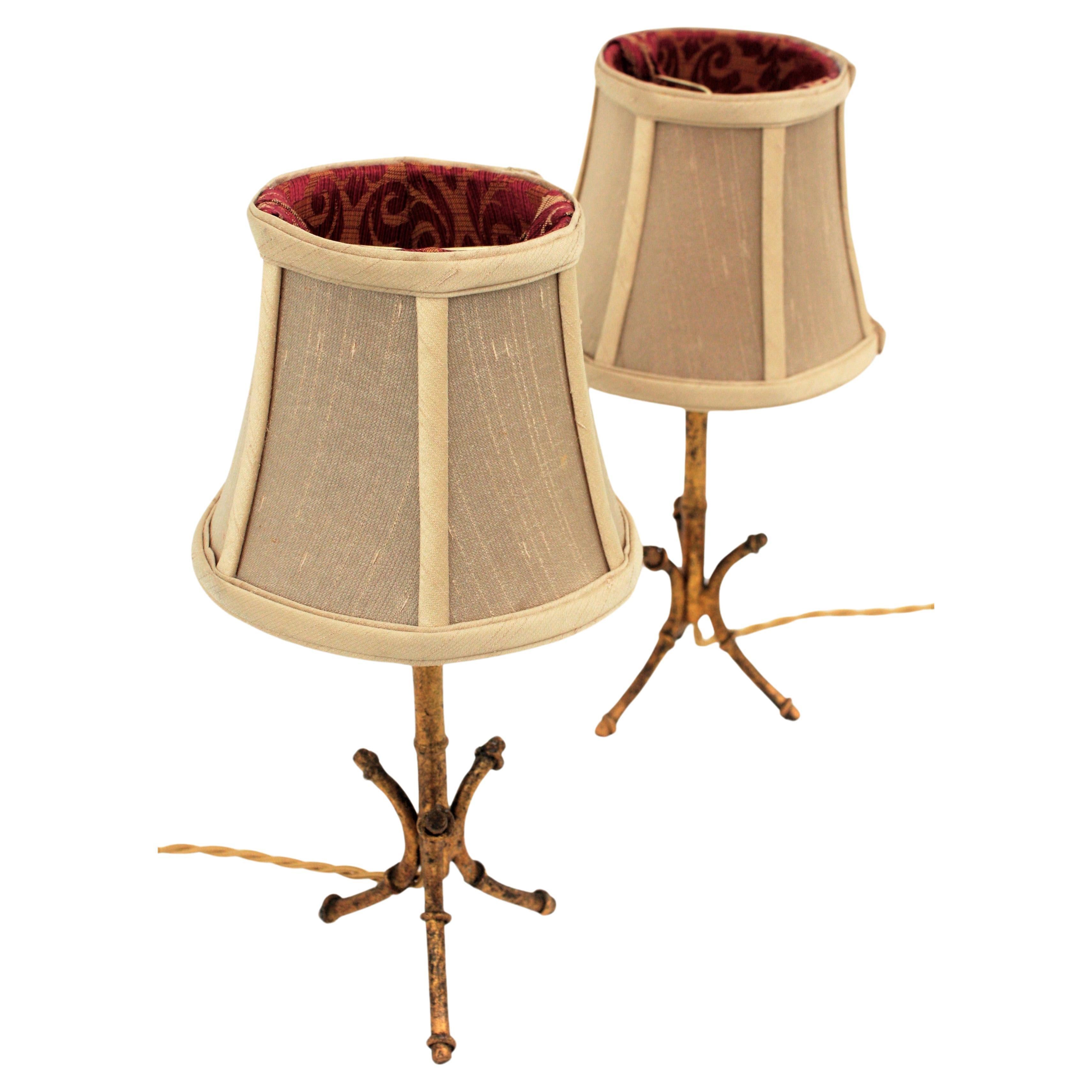 Pair of Faux Bamboo Gilt Iron Tripod Table Lamps, Maison Bagues Style For Sale