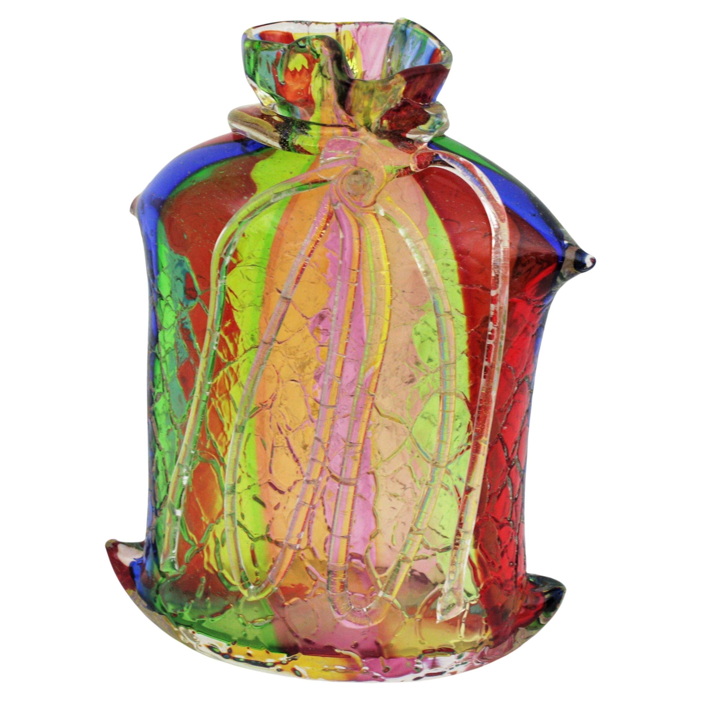 One of a kind hand blown multi-color rainbow stripped large vase with rope detail. Attributed to Fratelli Toso, Italy, 1950s.
This stunning large tied rope sack bag shaped art glass vase is made of multi-color thick stripes submerged into clear