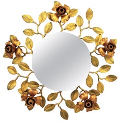 Miroir floral en métal doré polychrome à motif de feuillage