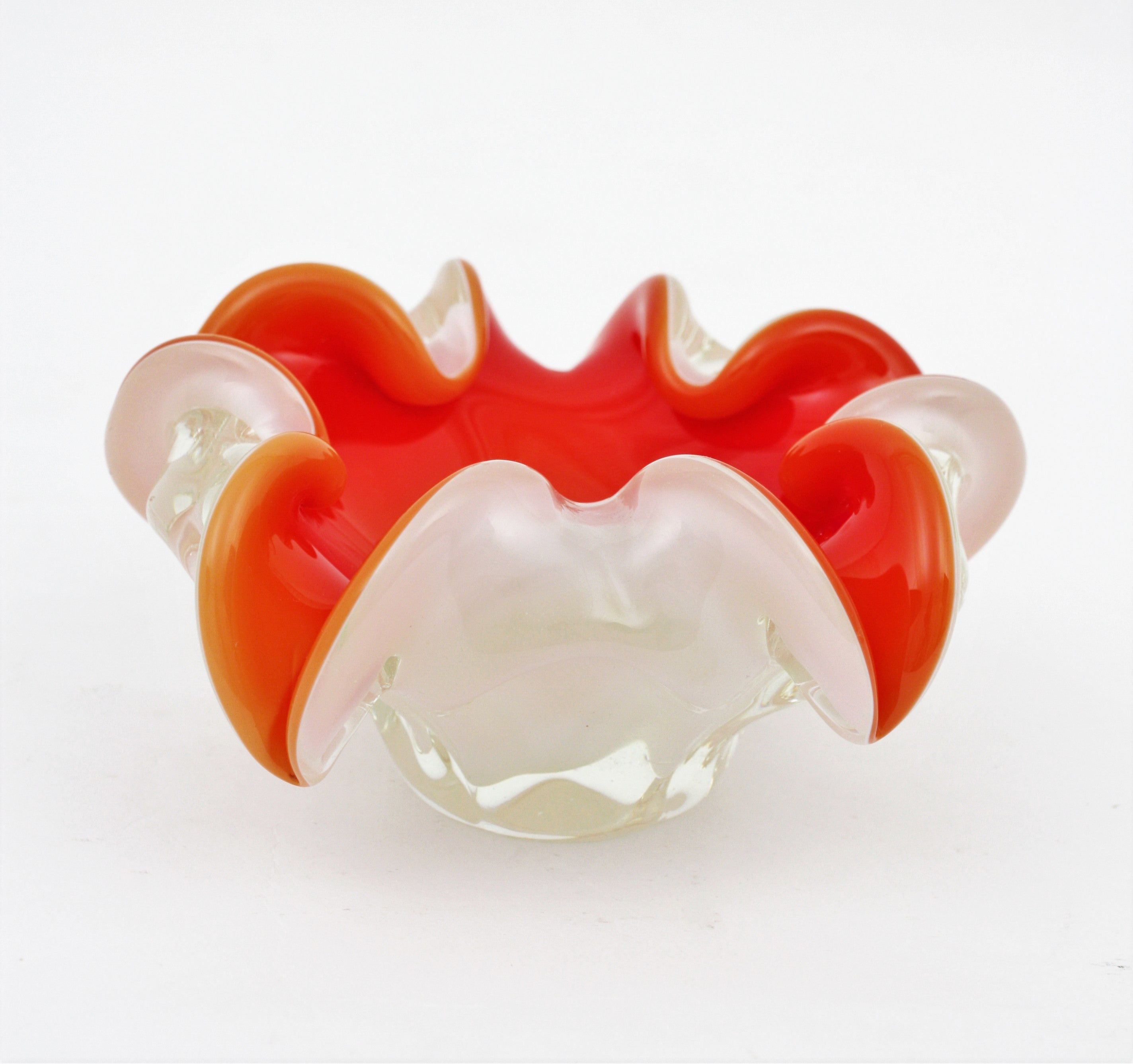 Flower Bowl / Vide-Poche / Ashtray,  Murano Glass, Italy, 1960s
Amazing hand blown Murano glass artistic flower shaped bowl or ashtray in vibrant red color and white.
Red glass and white opaline glass cased into clear glass.
This decorative bowl