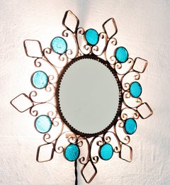 Backlit Iron Sunburst Mirror / Wall Light Fixture with Blue Glass Details, 1950s