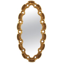 Giltwood Oval Carved Mirror by Francisco Hurtado