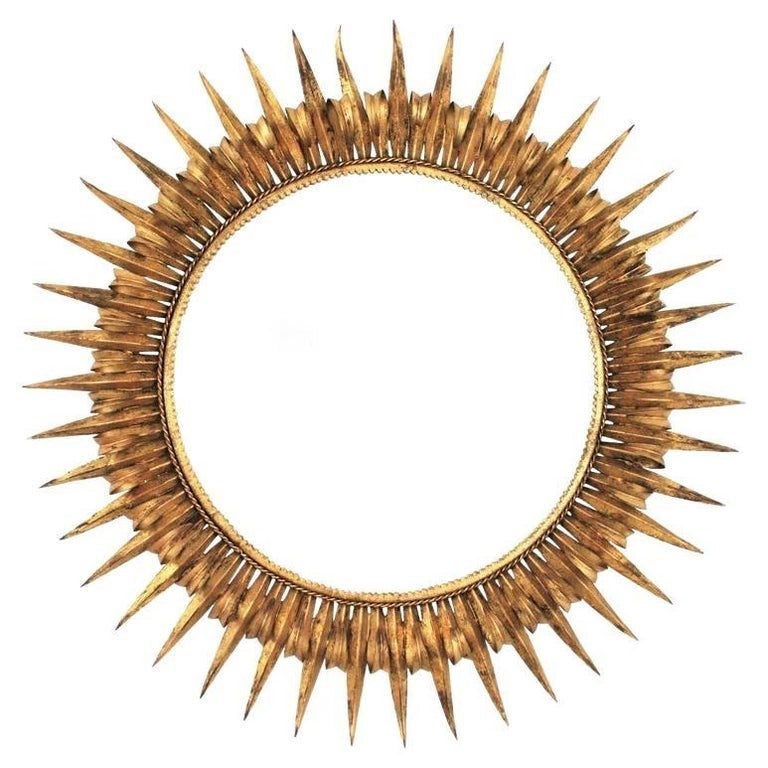 Großer französischer Wimpernspiegel mit Sonnenschliff, Schmiedeeisen vergoldet