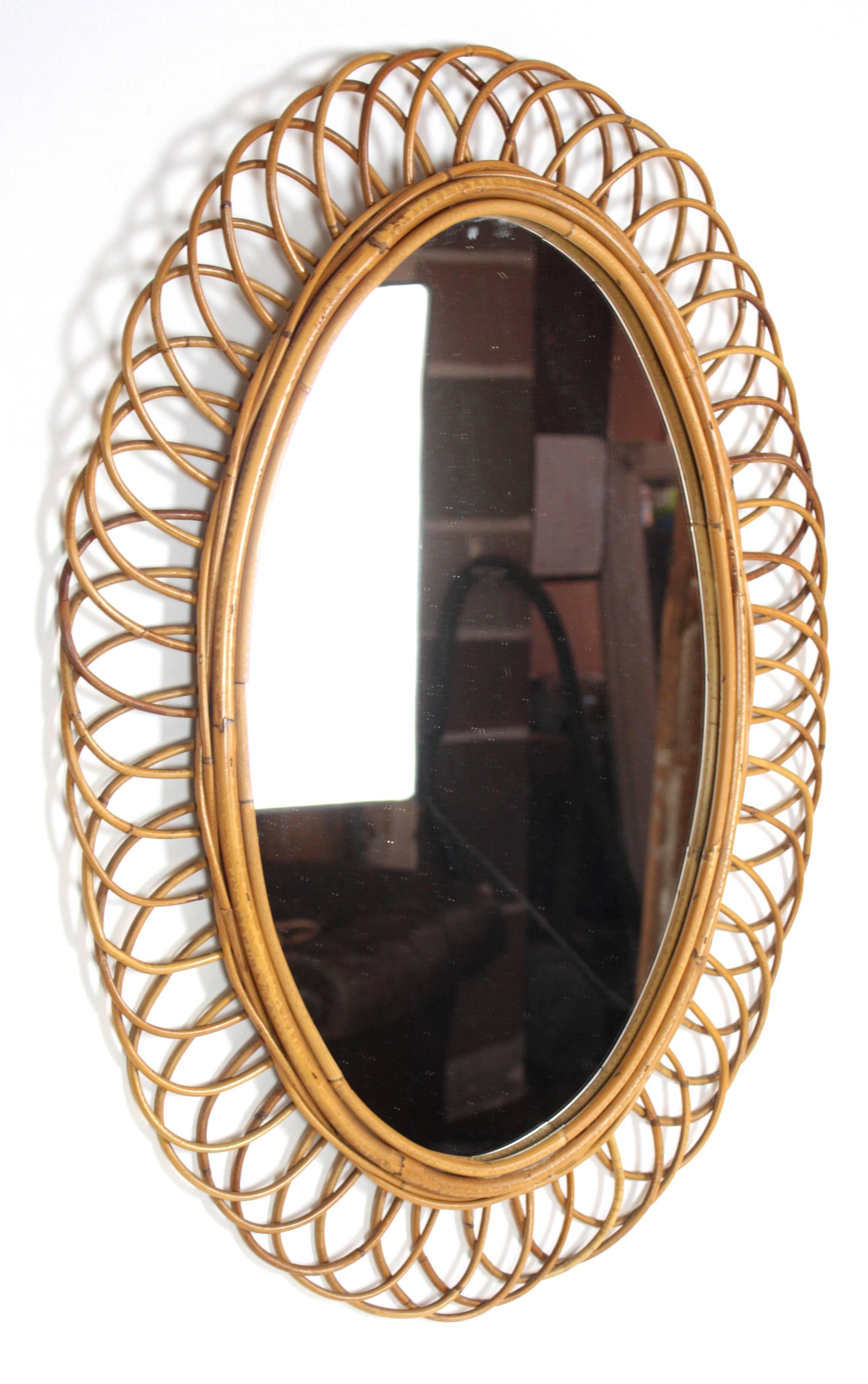 Beautiful bamboo flower burst mirror from the Mediterranean Coast.
Spain, 1960s.

Avaliable other mirrors in this manner:
Please, kindly check our storefront.