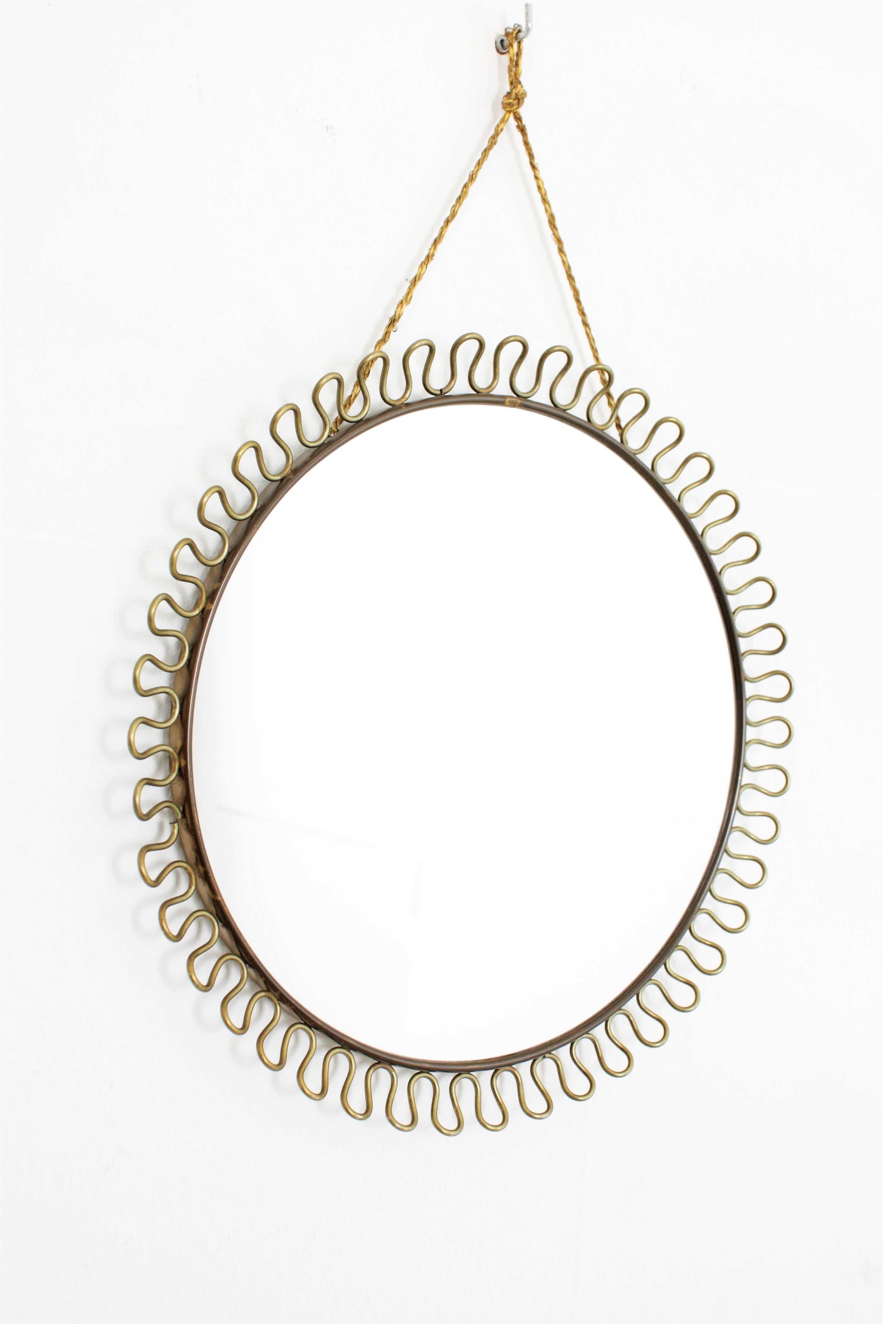 Beautiful small and delicate mirror with brass loop frame designed by Josef Frank for Svenskt Tenn.
J.Frank was born in Austria and is one of the most importart figures in Swedish Design
Josef Frank designed this mirror at the fifties and it was