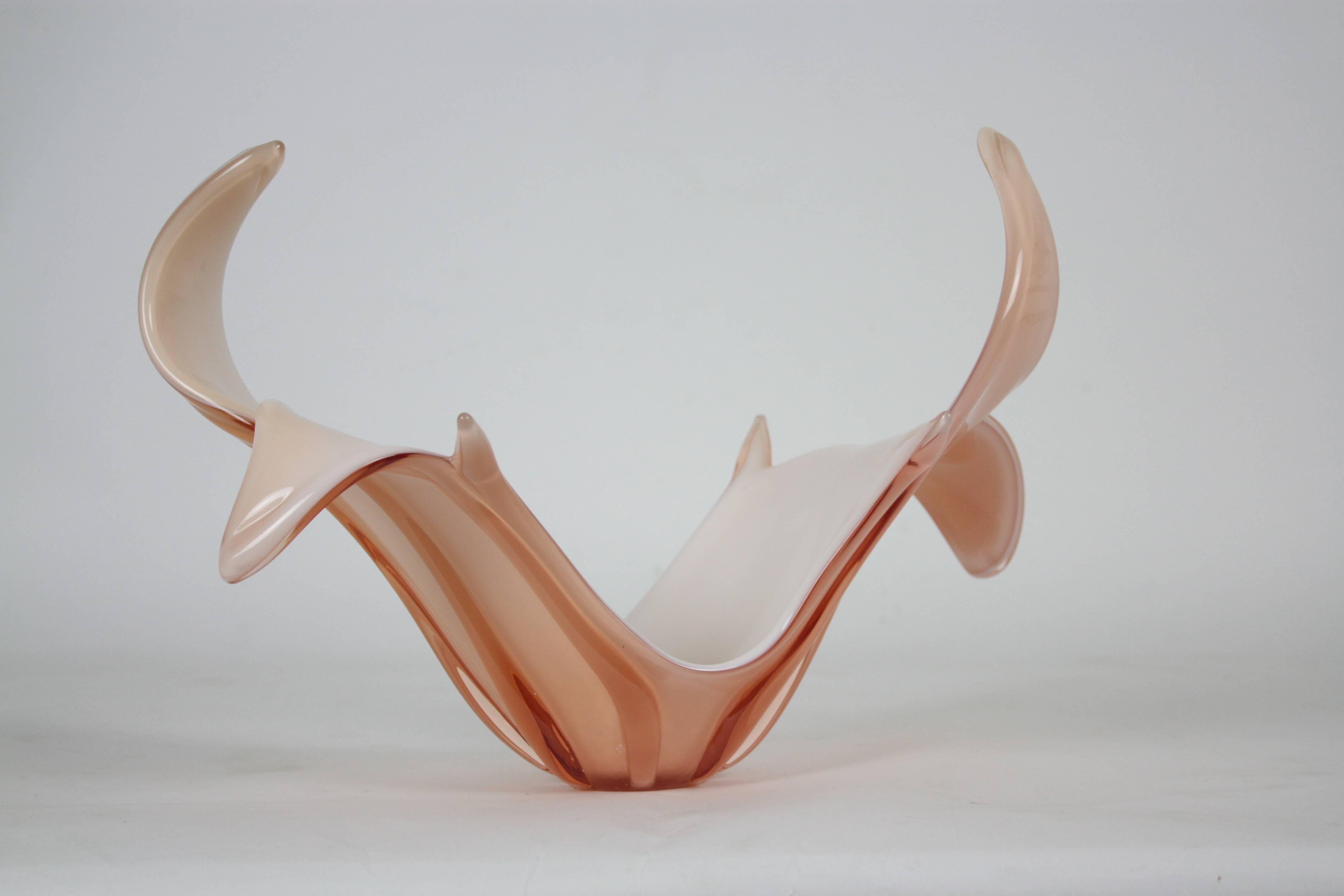 Sculptural Murano glass centerpiece in a delicate baby pink color. The interior part is made in white opaline glass.

Amazing organic design and impressive colors.