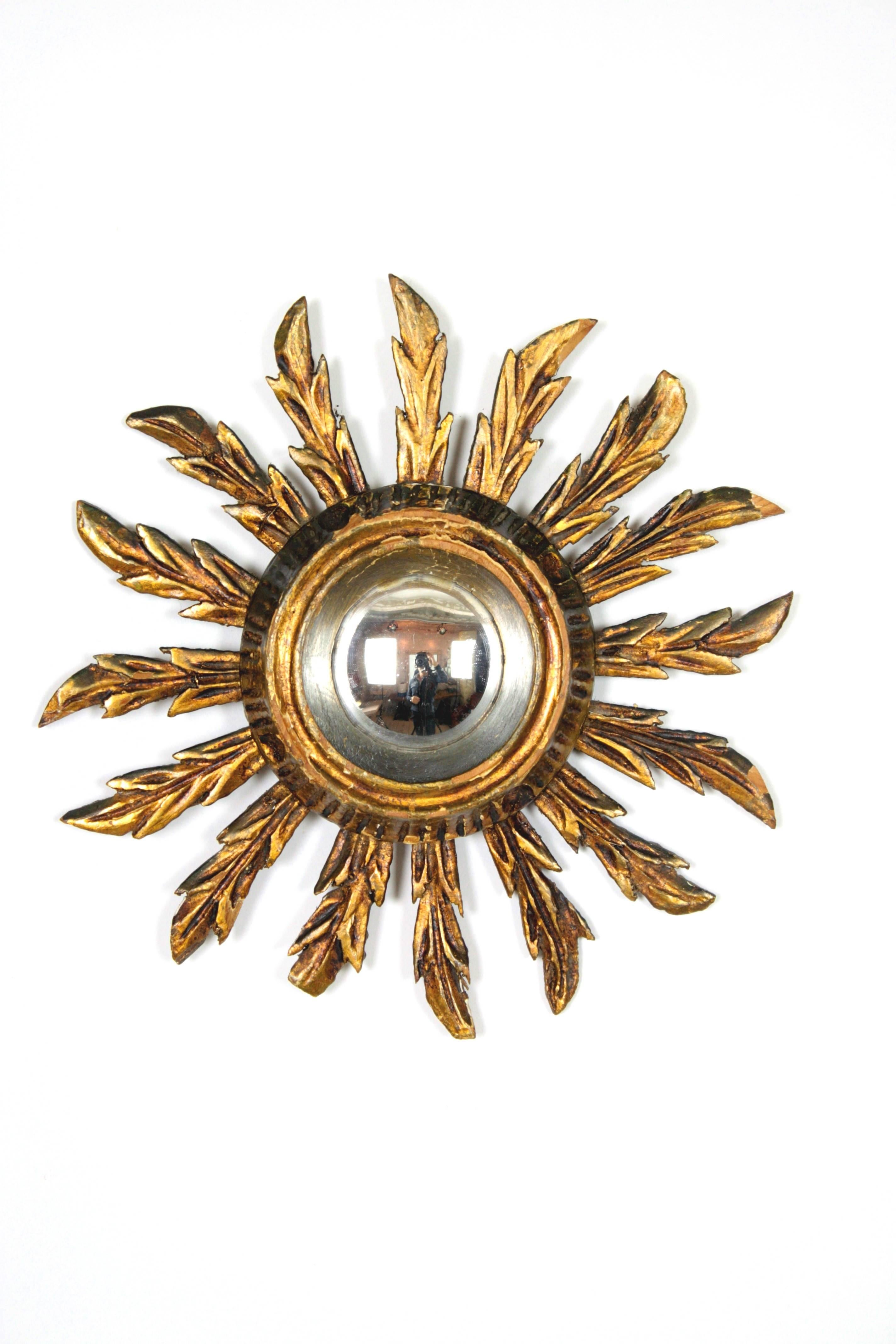 Spanish Pair of early 20th c. spanish giltwood convex sunburst mirrors