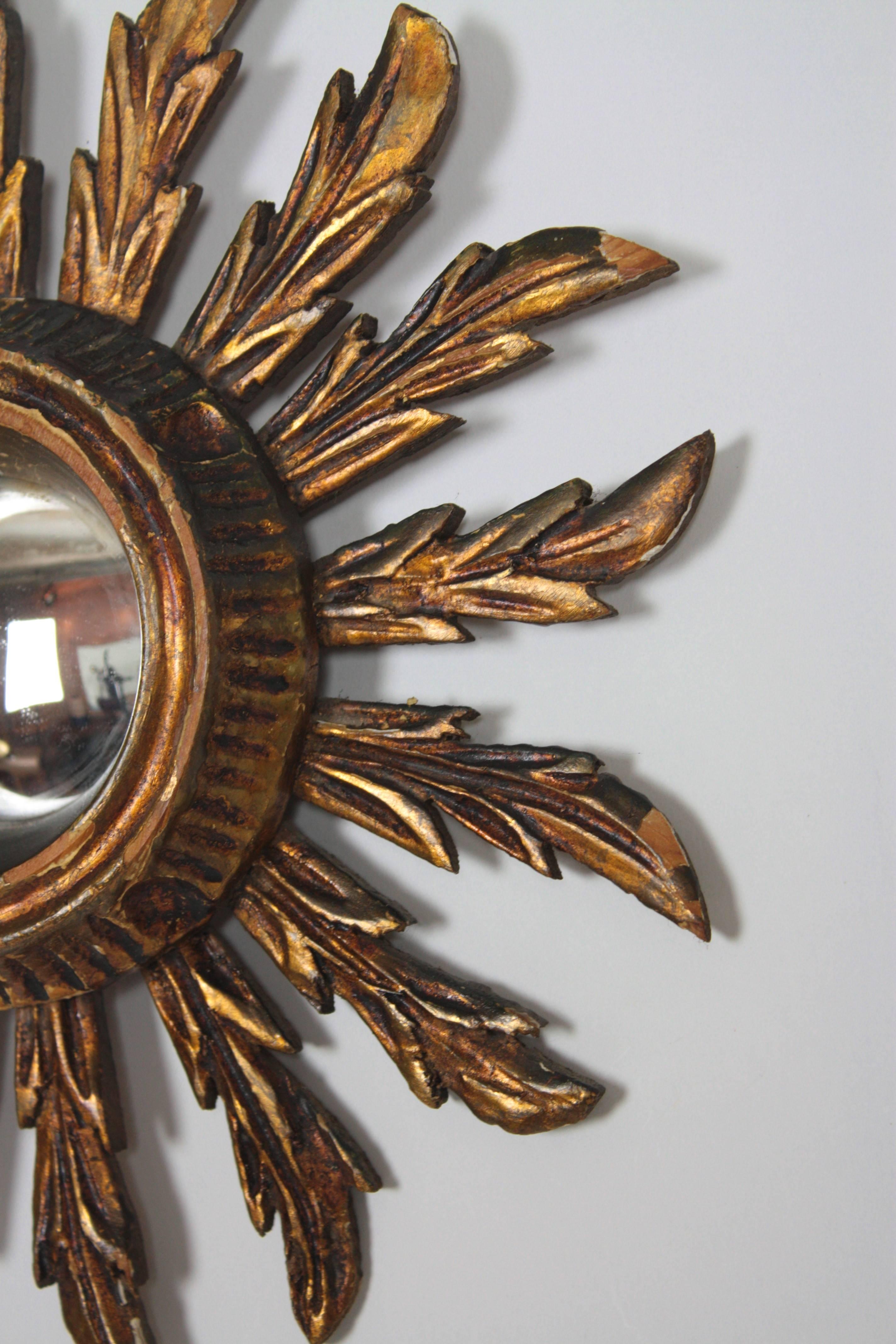 20th Century Pair of early 20th c. spanish giltwood convex sunburst mirrors