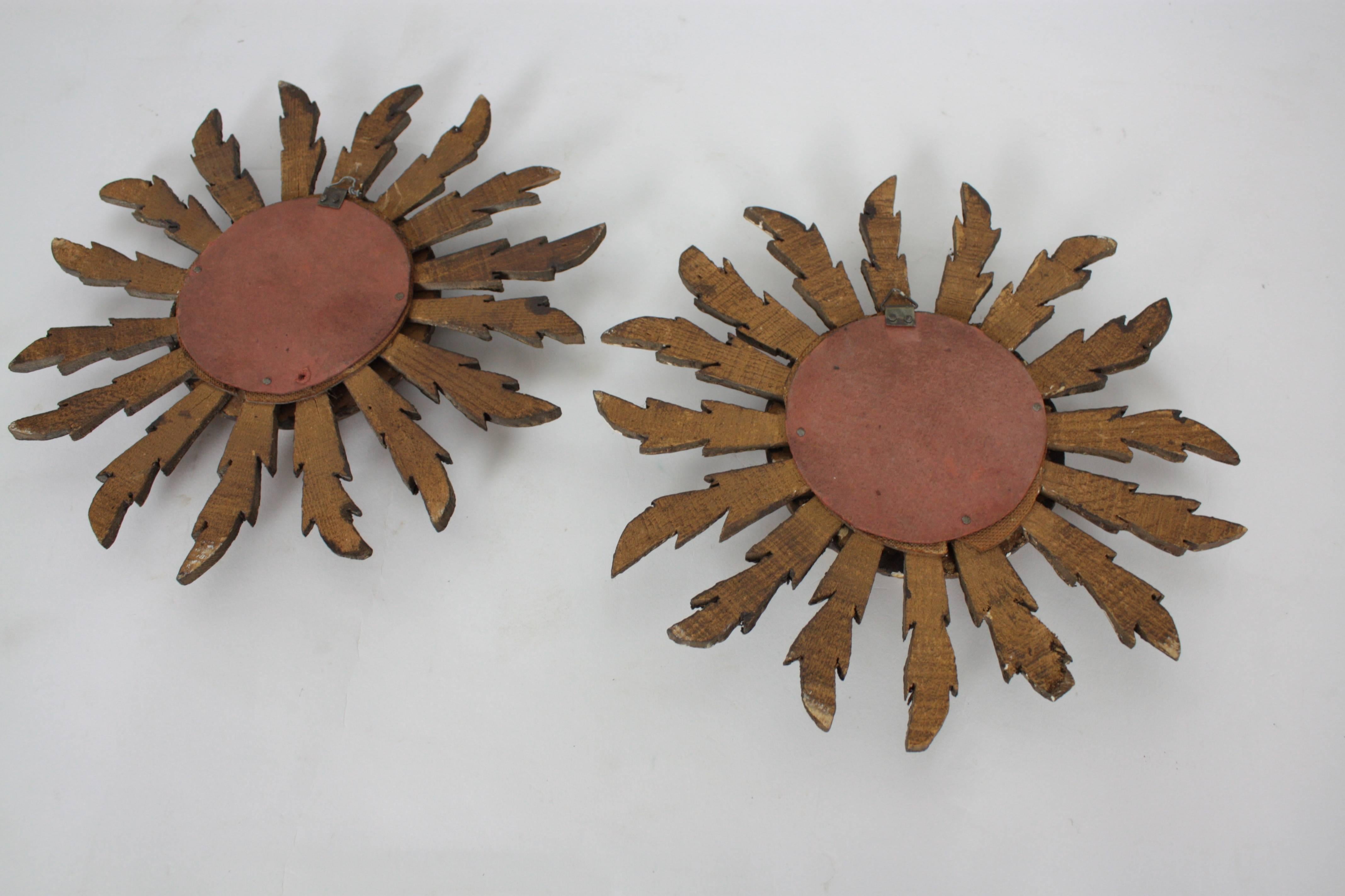 Pair of early 20th c. spanish giltwood convex sunburst mirrors 1