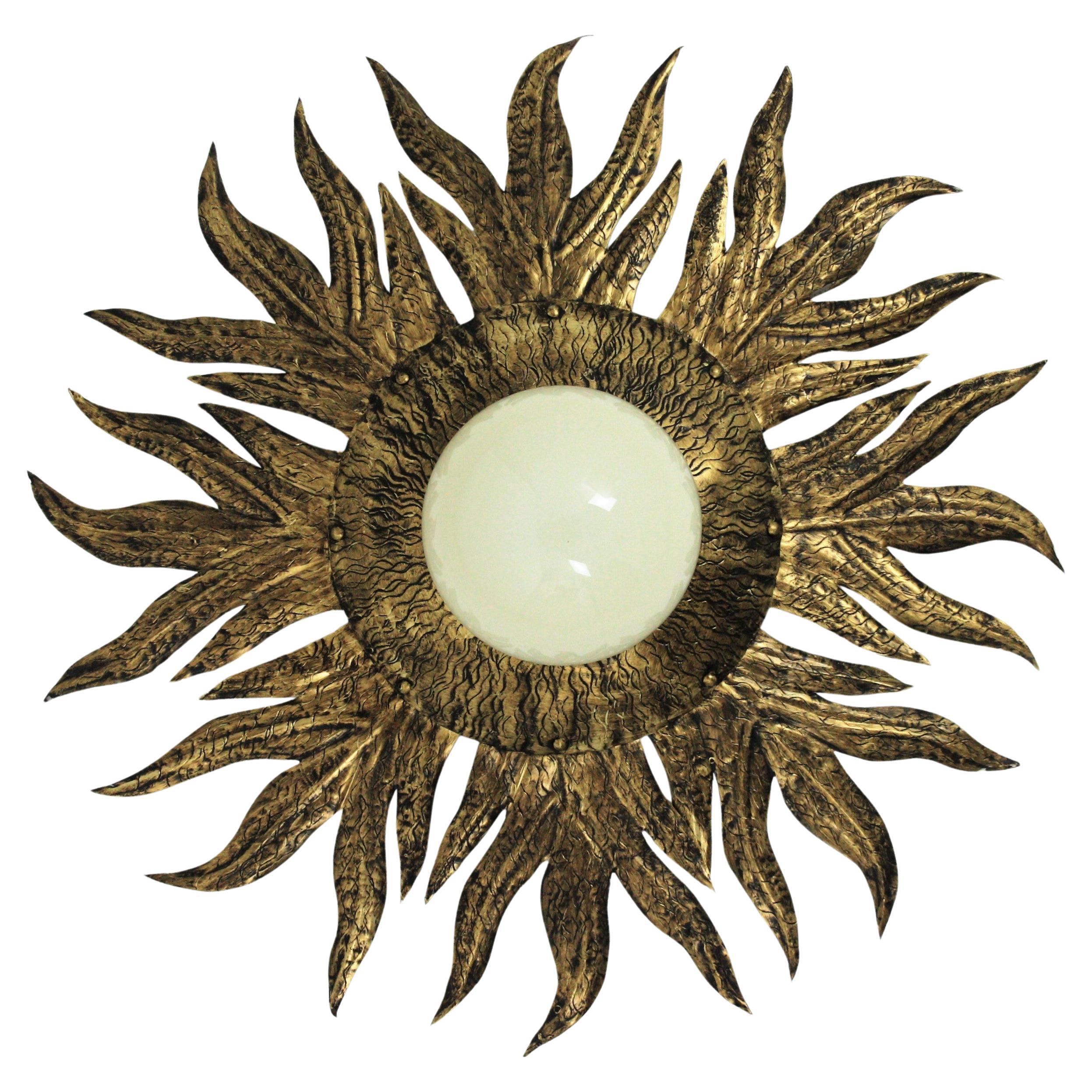 Sunburst Light Fixture in Gilt Metal and Milk Glass