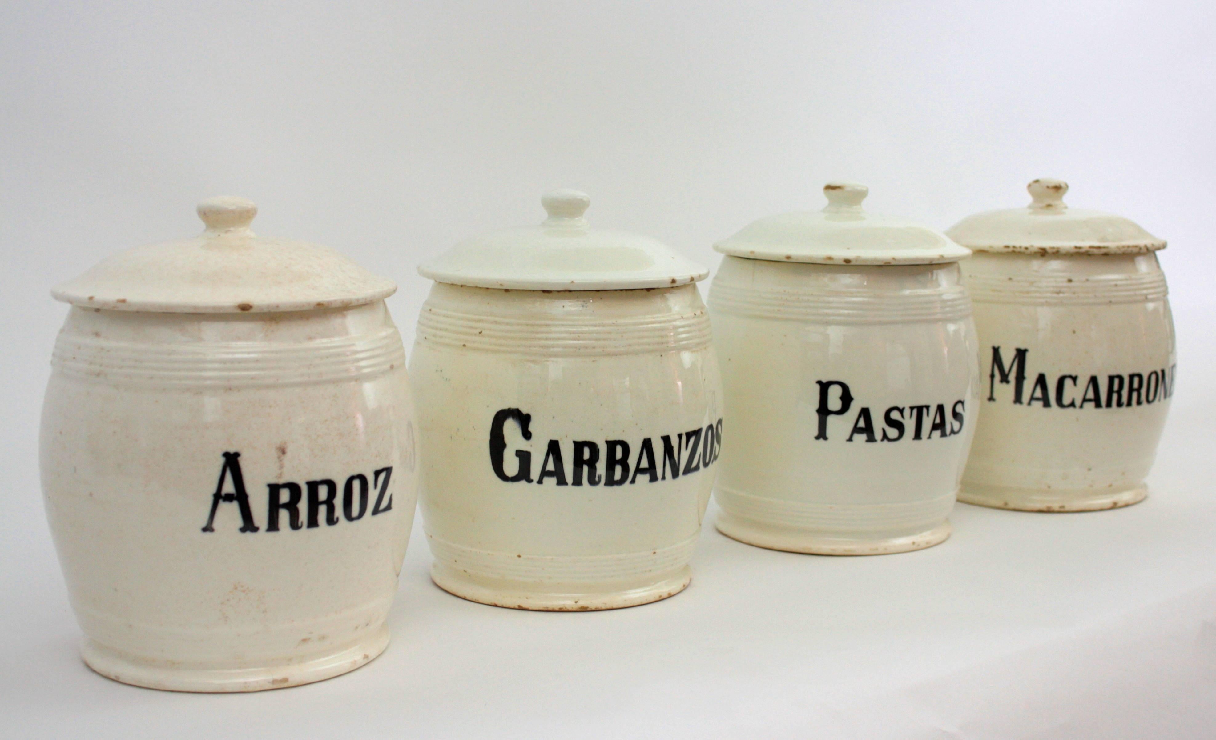 A very decorative set of four kitchen pots used as storage, Macarrones (macaroni), Garbanzos (chickpeas), Arroz (rice), and Pastas (pasta).

Useful for decorative purposes.
      