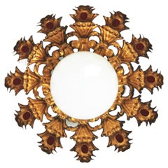 Sunburst Flush Mount Light Fixture in Gilt Iron with Milk Glass Globe