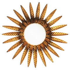 Sunburst Ceiling Light Fixture in Gilt Iron with Milk Glass Globe