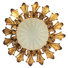 Large 1950s Sunburst Flush Mount in Gilt Iron with Frosted Glass Globe