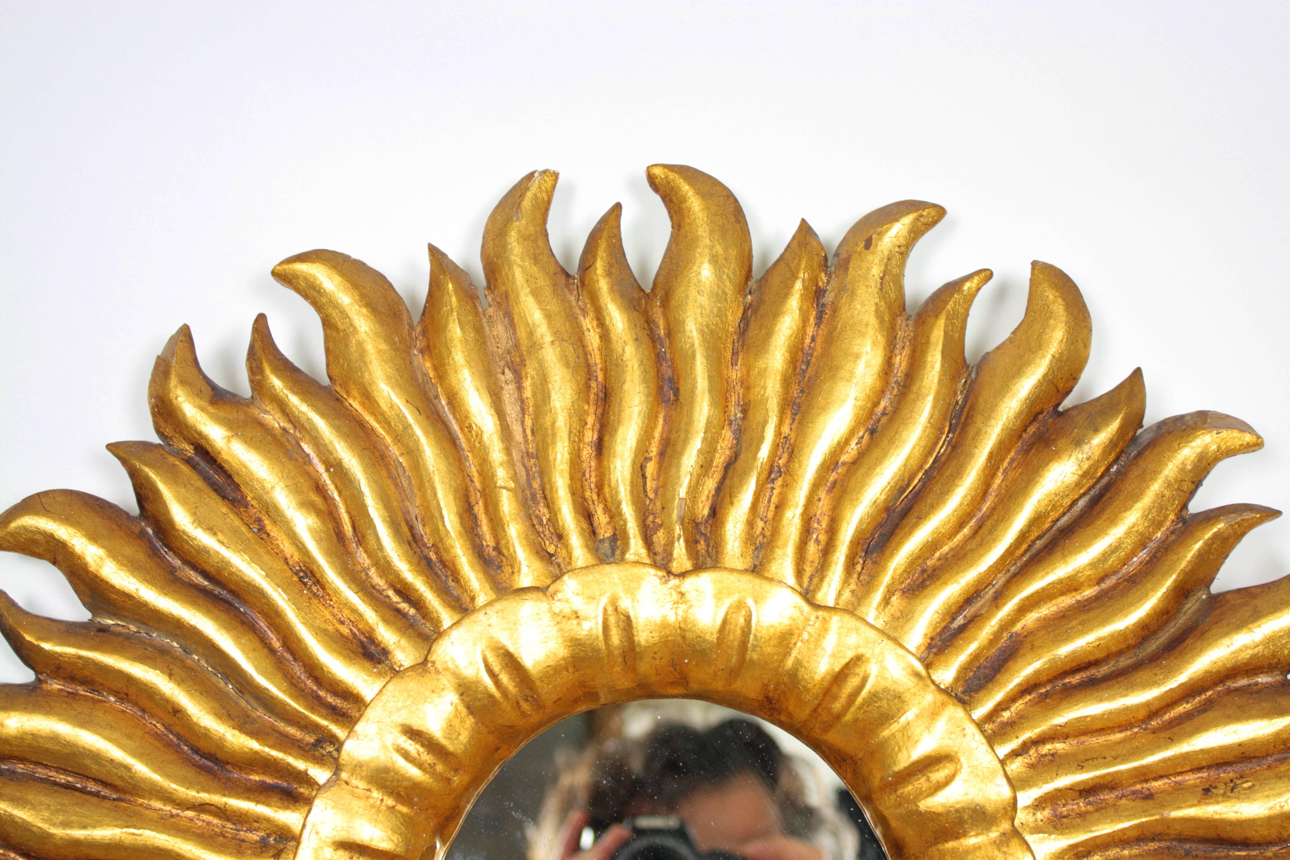 Glass Spanish 1930s Hollywood Regency Gold Leaf Giltwood Carved Sunburst Mirror