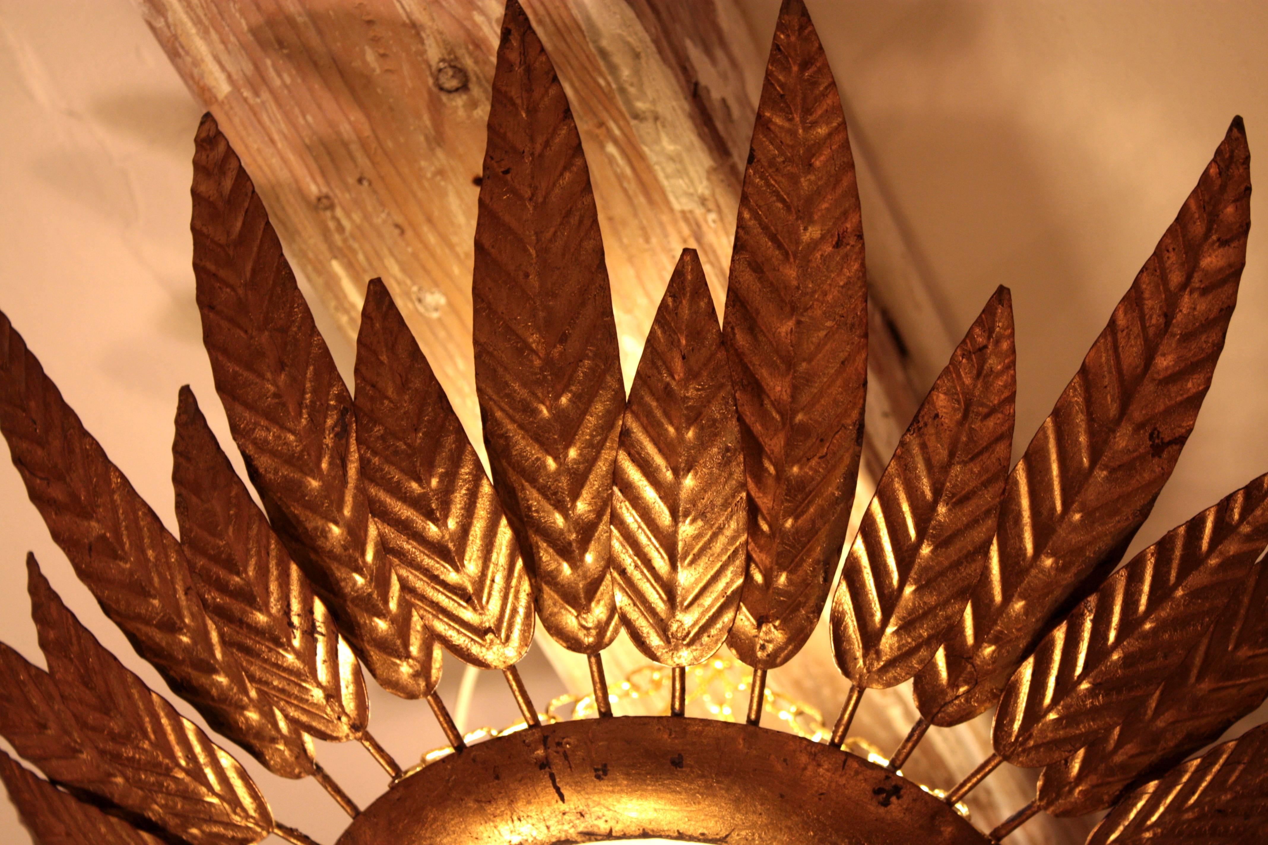 Hollywood Regency Spanish Gilt Iron Sunburst Pendant or Ceiling Fixture