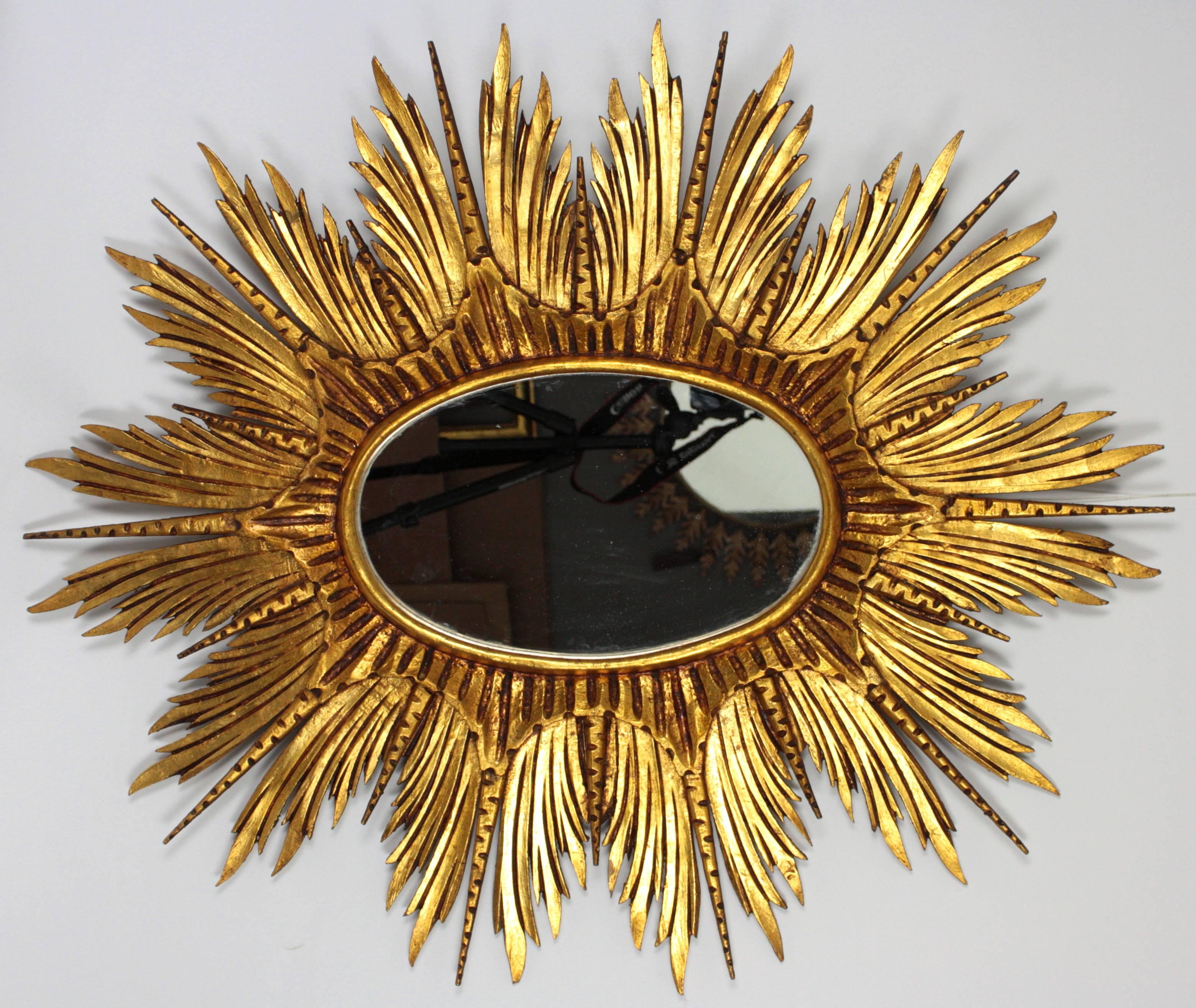 Large Spanish Carved Giltwood Sunburst or Starburst Oval Mirror 1