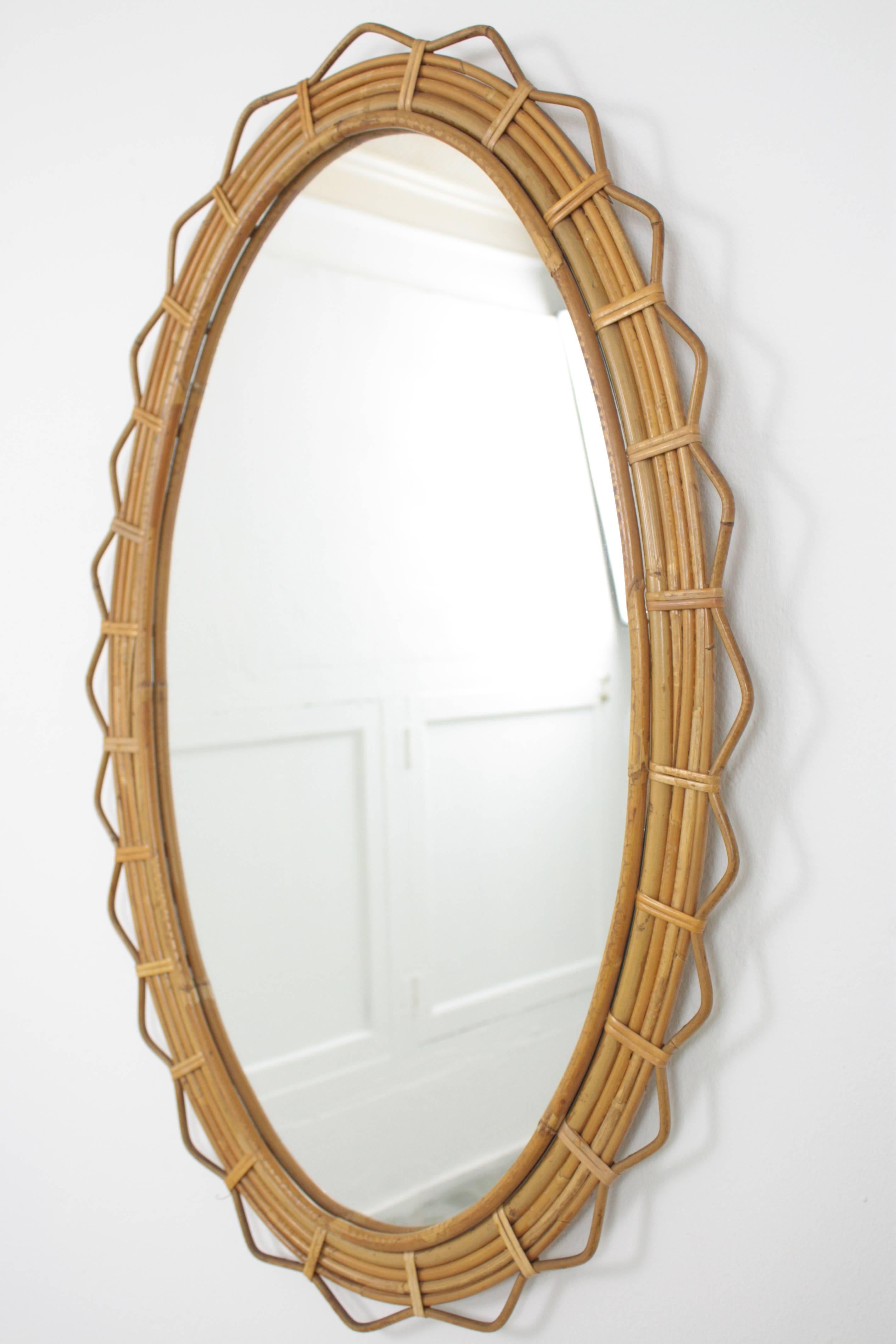 A spectacular handcrafted bamboo and rattan mirror with a beautiful geometric design frame. This piece has all the taste of the Mediterranean French Riviera,
France, 1950s.

Lovely to place it alone or creating a wall decoration with other