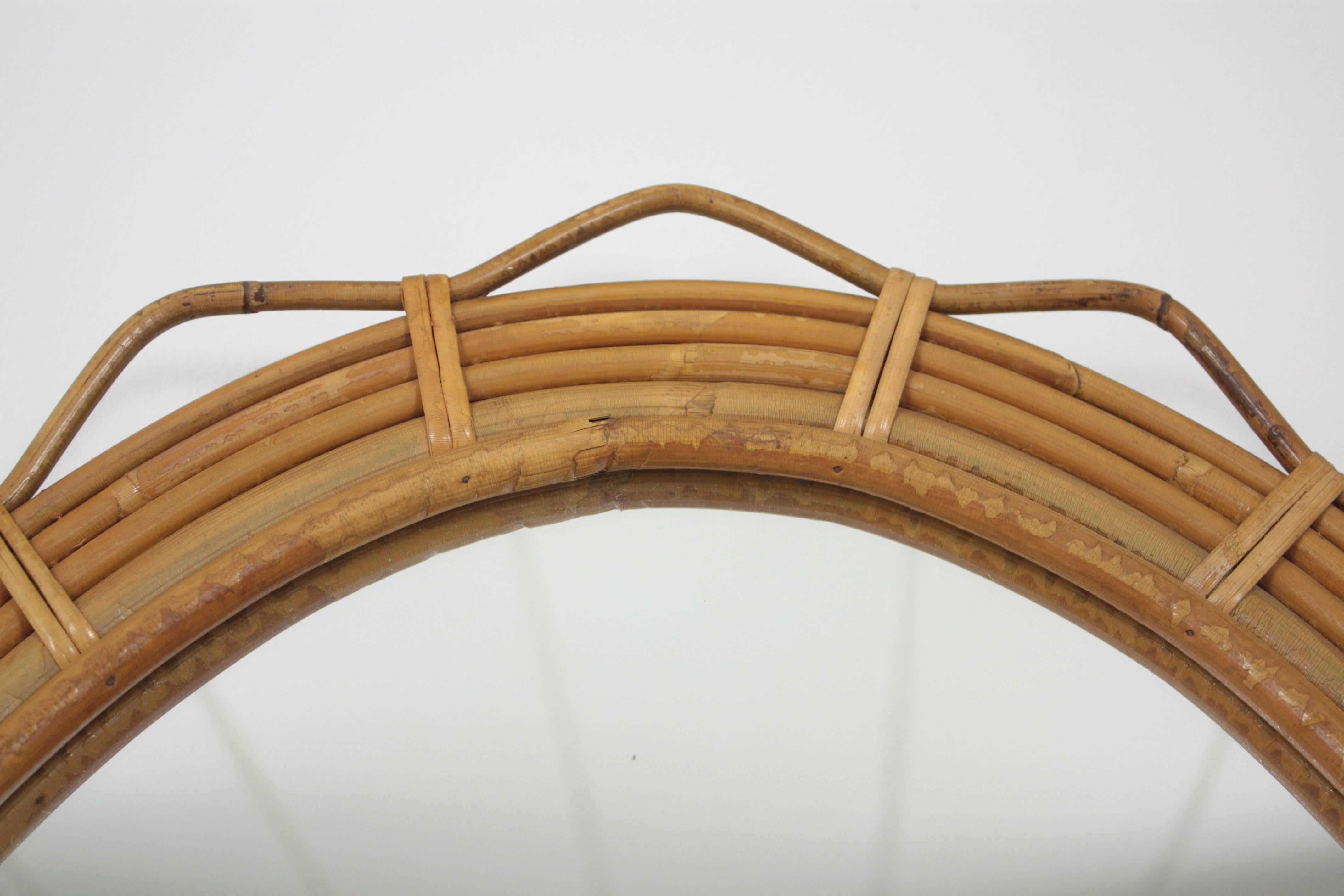 Hand-Crafted Large 1950s Saint-Tropez Bamboo and Rattan Oval Sunburst Mirror