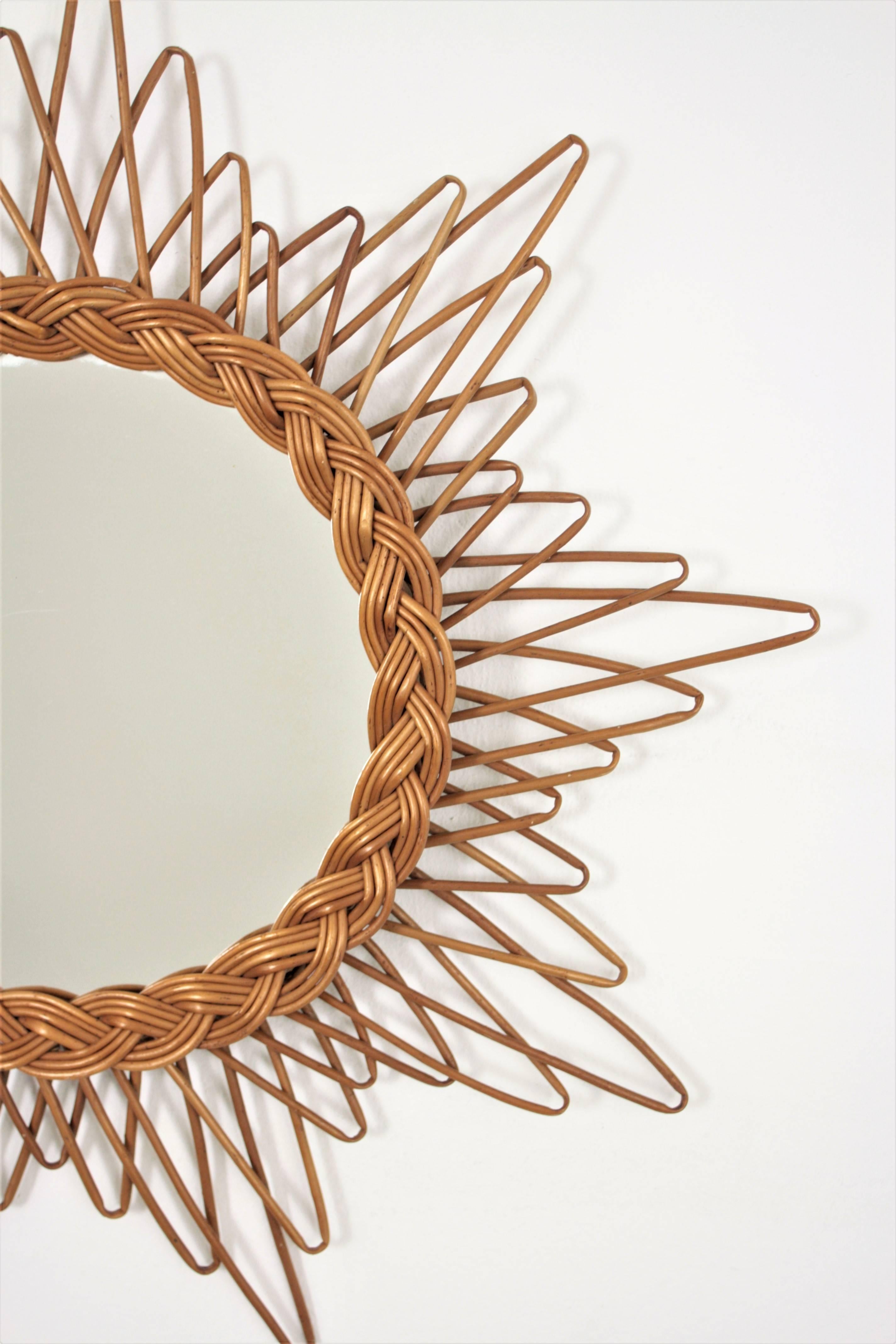 Lovely handcrafted rattan mirror with starburst or sunburst shape.
Beautiful placed alone but also perfect to create a wall decoration with mirrors in this manner. This piece has all the taste of the French Riviera style and it is in excellent