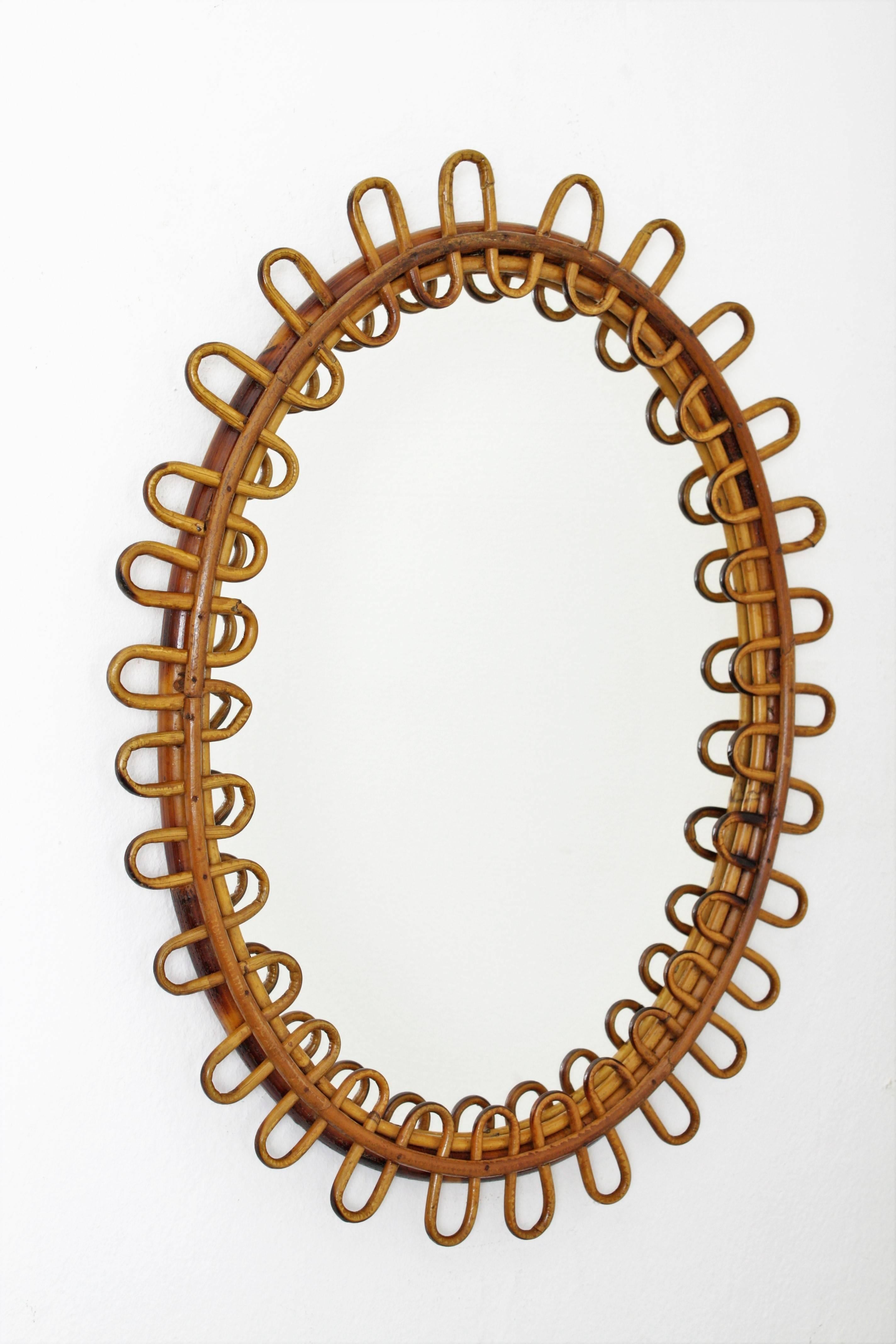 A highly decorative mirror with curved rattan beams in the manner of Jean Royere. France, 1950s.
Very beautiful to place it alone but also gorgeous mixed with other mirrors in this manner creating a wall decoration.

Please, kindly check our