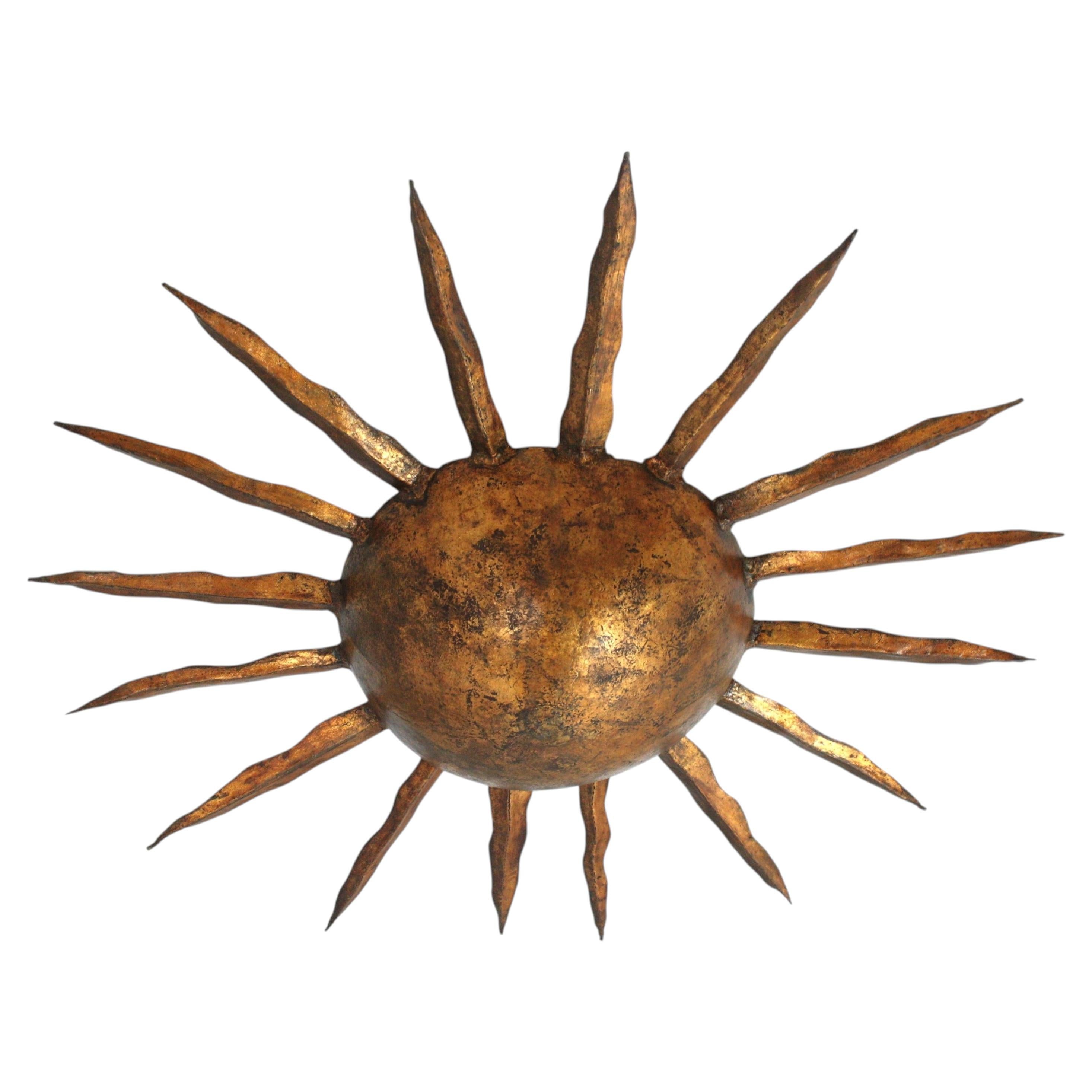 1940s Large Sunburst Ceiling Light Fixture in Gilt Iron, Gilbert Poillerat Style For Sale