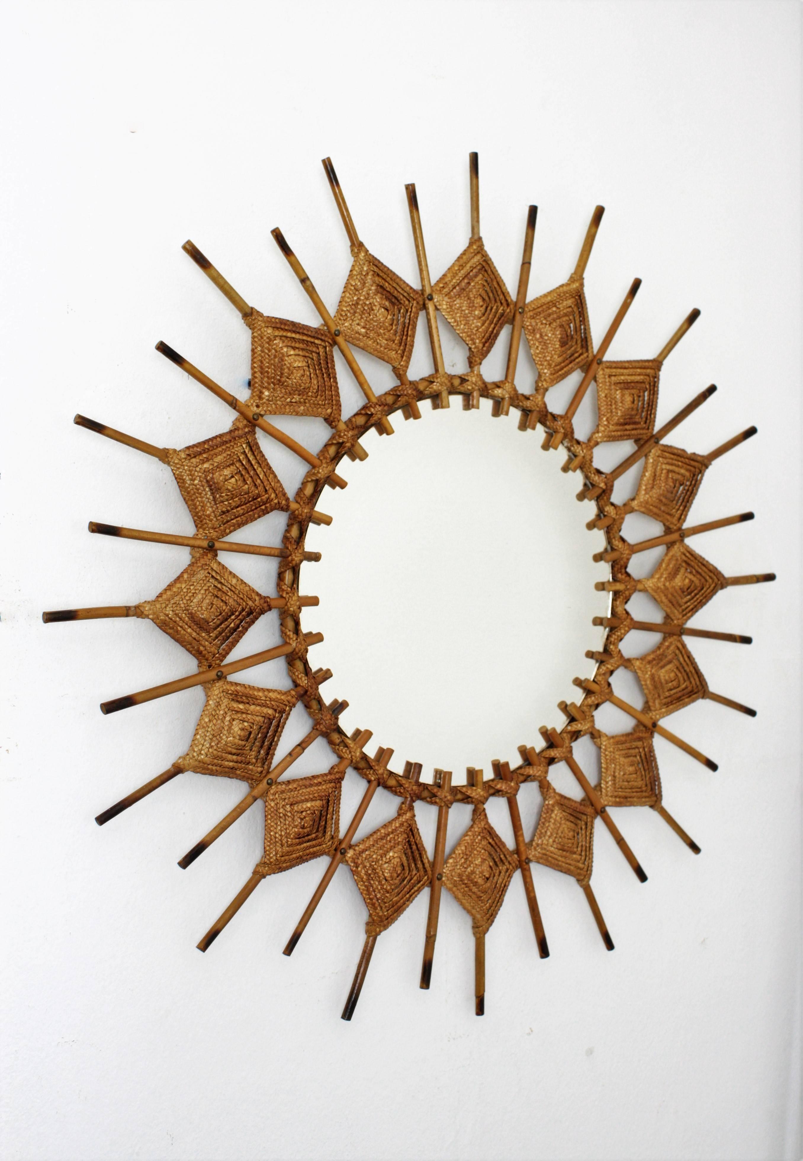 Beautiful and unusual handcrafted rattan sunburst or starburst mirror. Mediterranean coast style. Woven natural fiber rhombus decorations on the frame.
Highly decorative placed with other mirrors in this manner as a wall decoration. Also beautiful