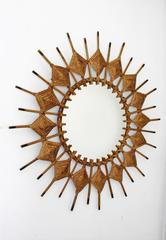 Rare Spanish Mid-Century Modern Handwoven Rattan Sunburst Mirror, 1950s