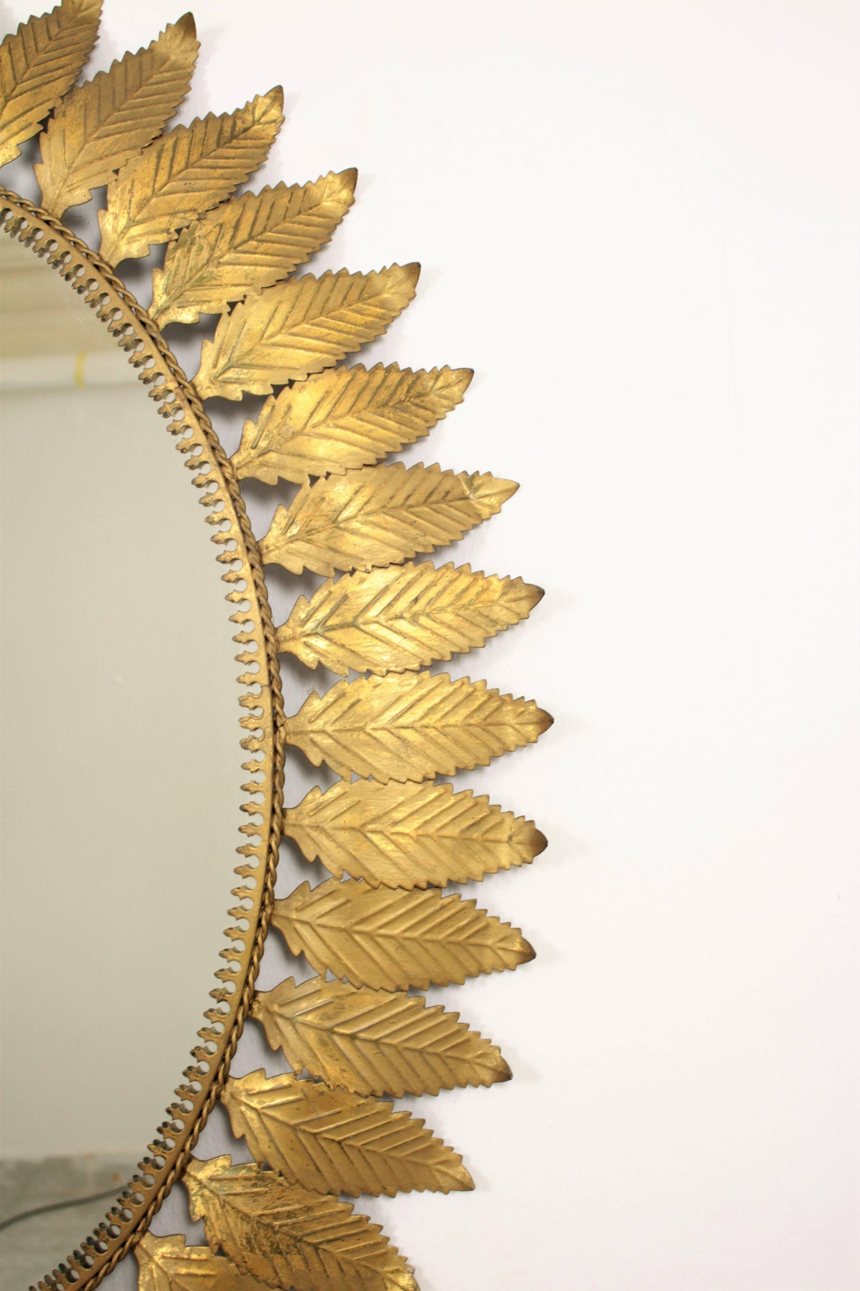 Mid-Century Modern Huge Oval Spanish Gilt Iron Leafed Sunburst Mirror