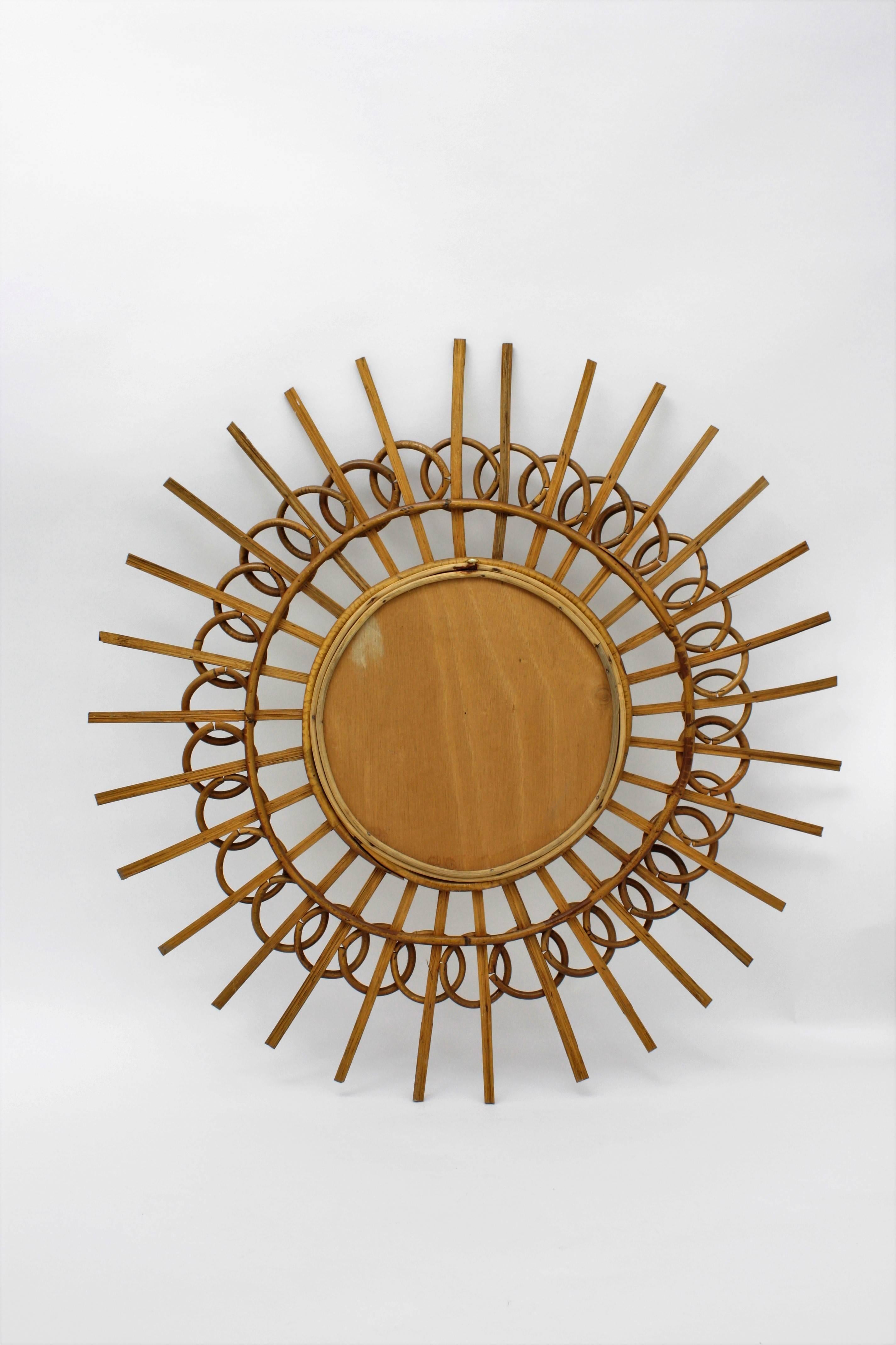 1960s French Riviera Mid-Century Modern Rattan Sunburst Mirror Framed by Circles 1