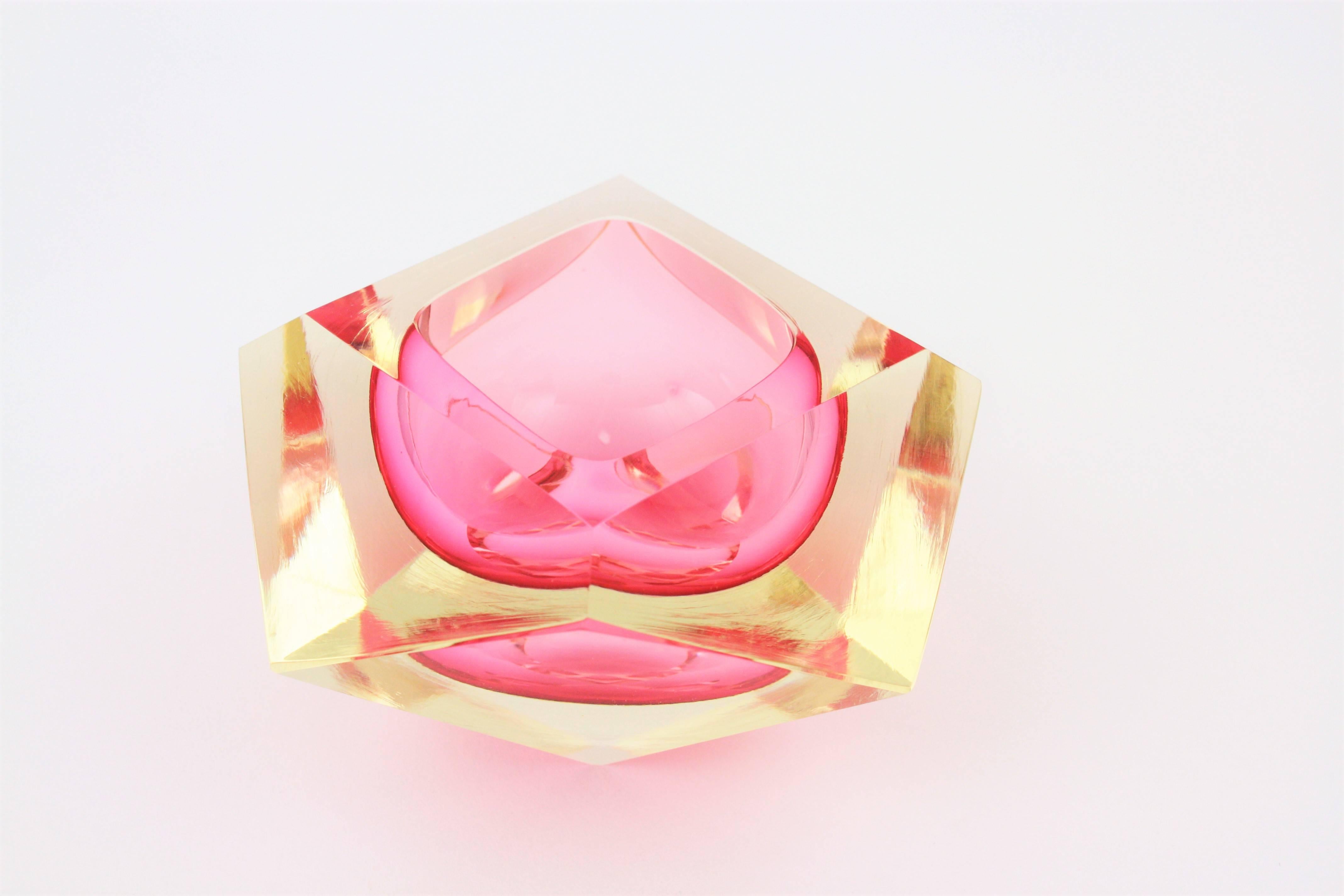 Flavio Poli Sommerso faceted diamond shaped Murano glass ashtray in neon pink and light cranberry glass cased into yellow glass. 
Italy, 1950s.

The piece is in excellent condition.
Gorgeous placed with other Murano glass pieces as a