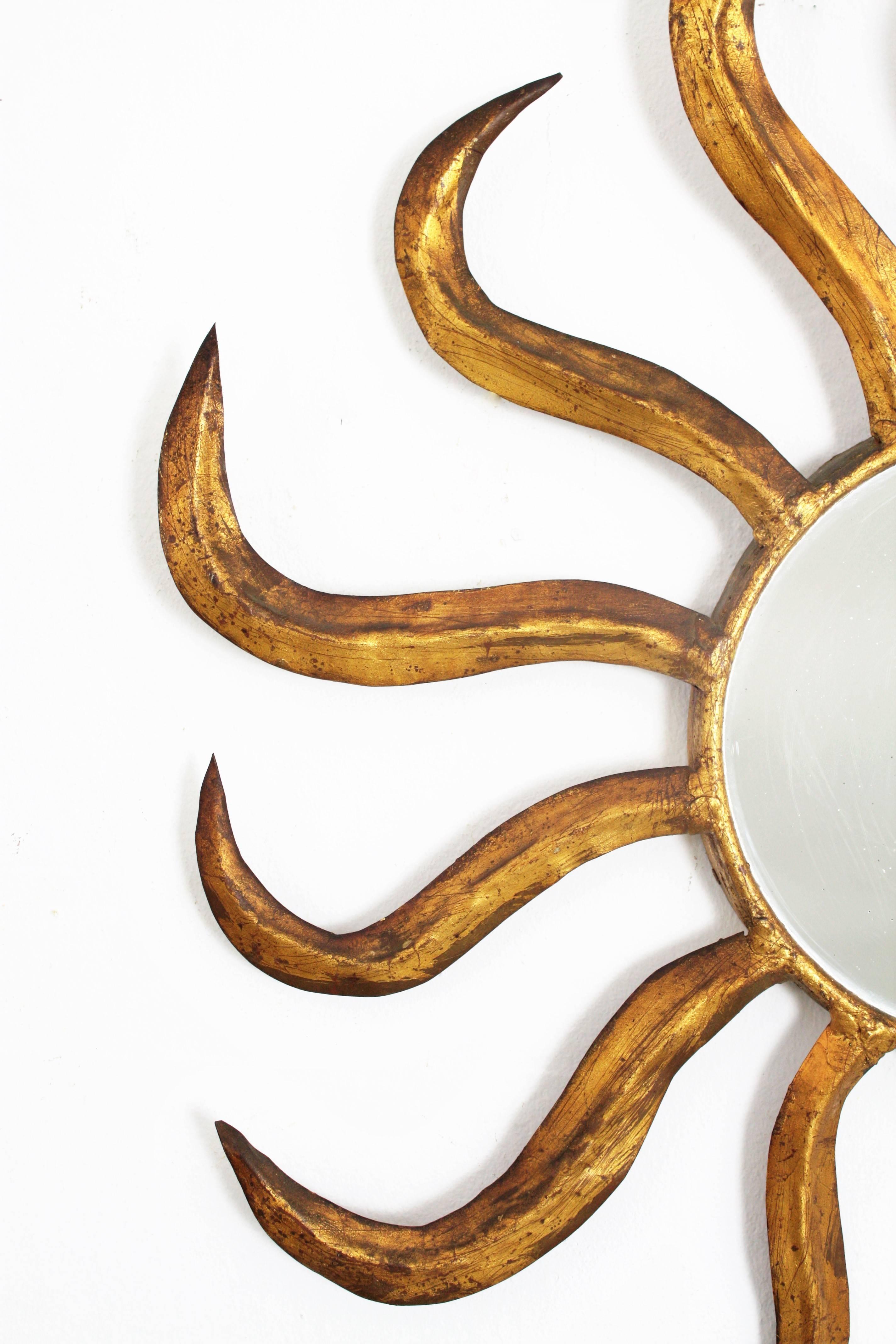 Mid-Century Modern French, Early 20th Century, Gold Leaf Gilt Iron Twisted Sunburst Mirror