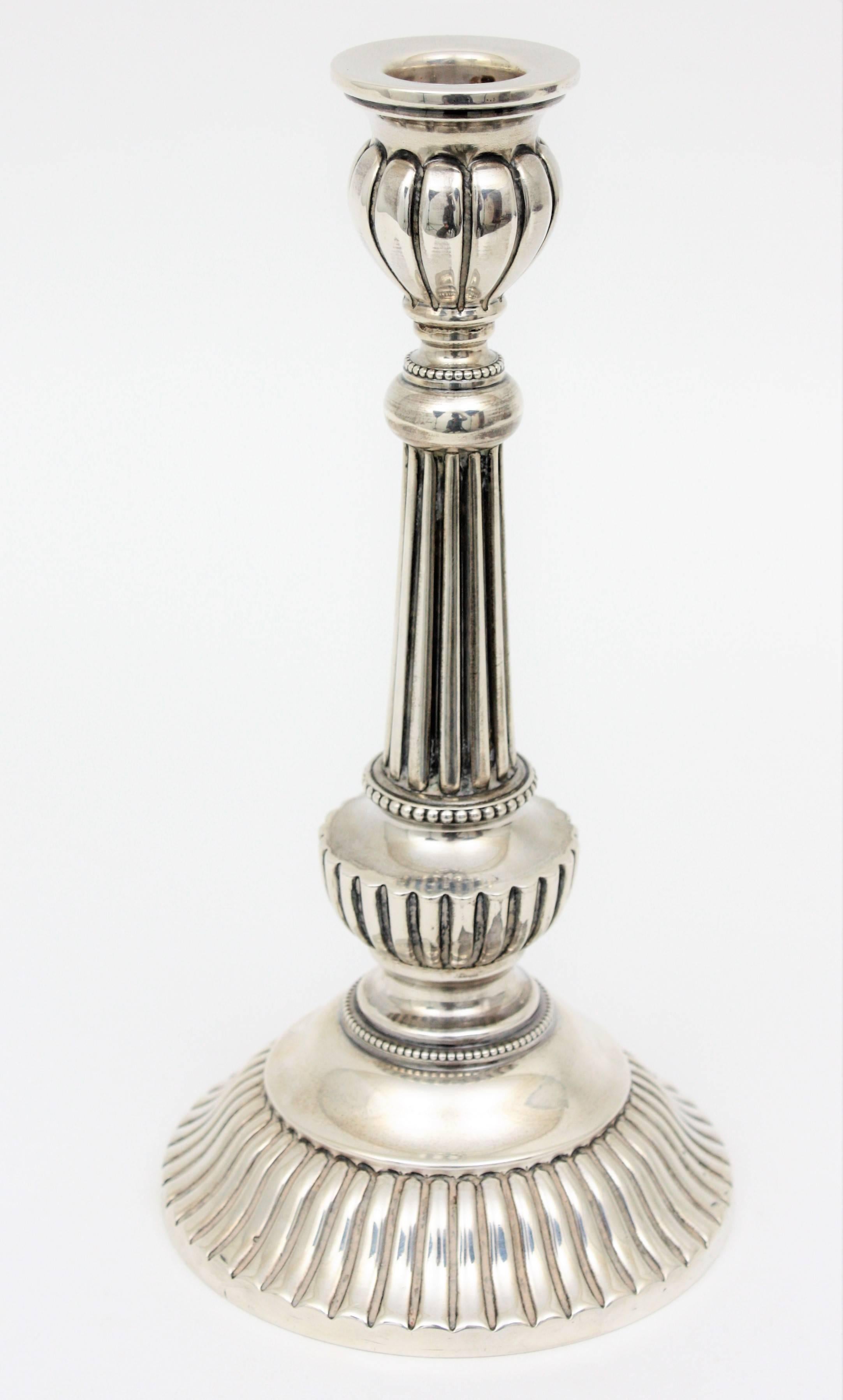 1940s Spanish Louis XVI Style Sterling Silver Candlestick
Louis XVI sterling silver candleholder.
Stamps: Star-940.
Dimensions: Height 22.5 cm x diameter: 11 cm
Spain, 1950s-1960s.

Perfect as a gift idea!
