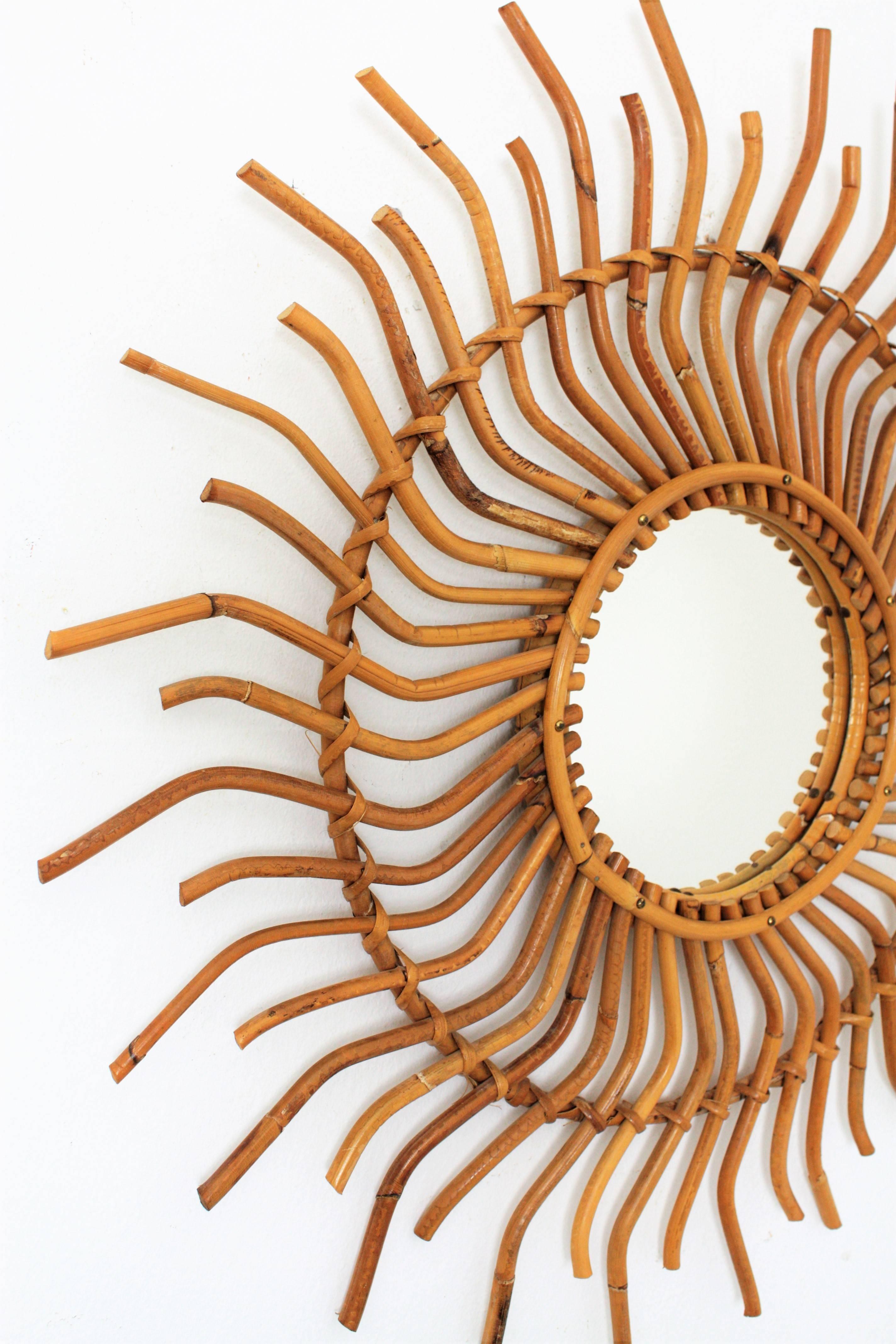 Mid-Century Modern 1960s Spanish Bamboo Rattan Sunburst Pinwheel Mirror with Curly Beams