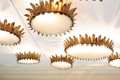 Set of Seven French Neoclassical Gilt Iron and Frosted Glass Crown Flush Mounts