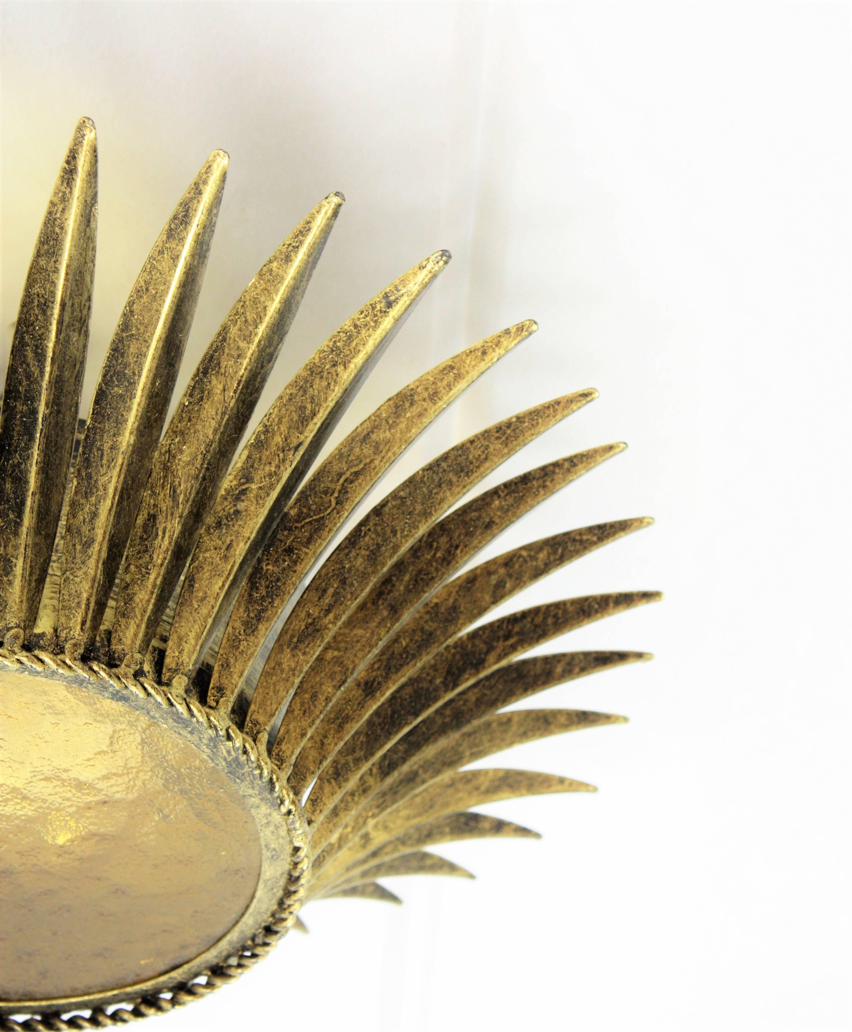 Spanish, 1950s Gilt Iron Sunburst Crown Ceiling Fixture with Amber Glass 1